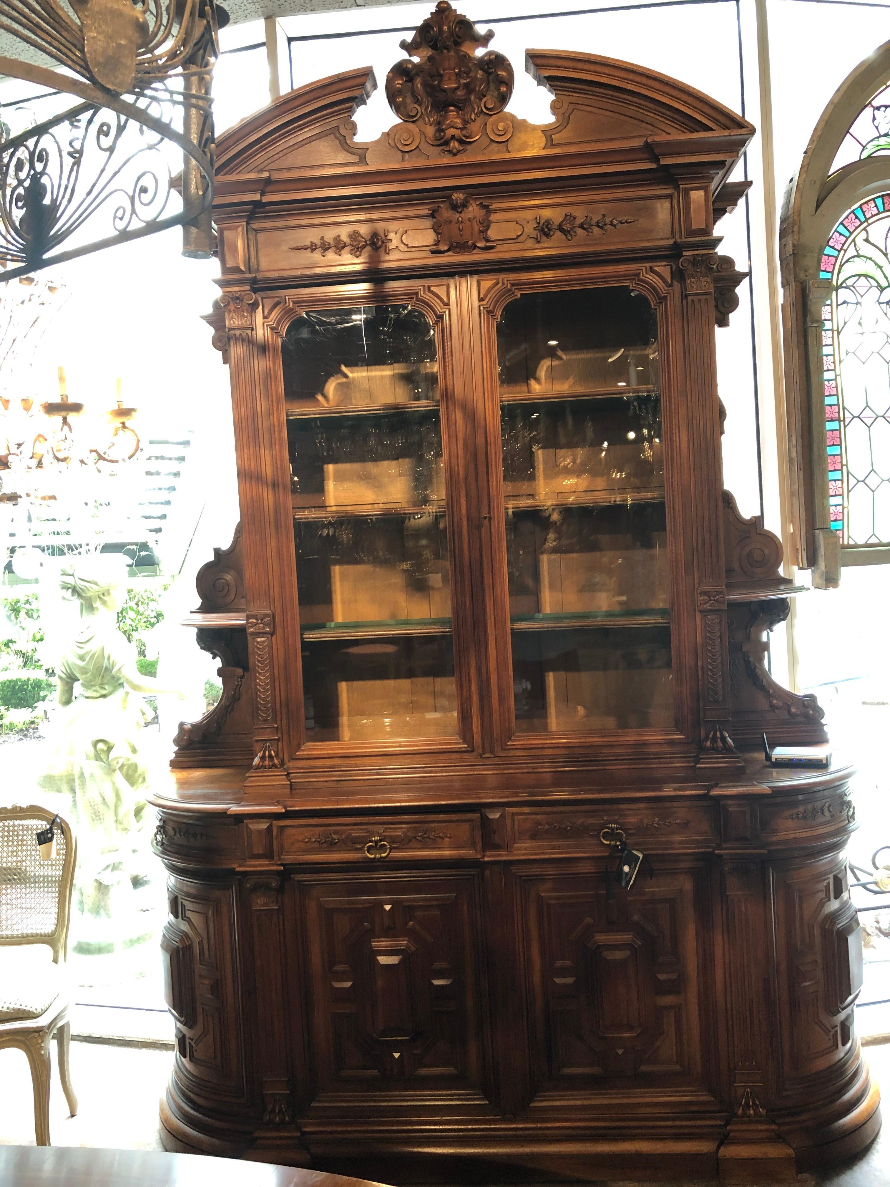 Large and exceptional French walnut
piece! Excellent as a display cabinet
or for use in a library as a book case.
The top piece has had mirror on the back 
To enhance display. The curved sides are
Appealing in the overall design.