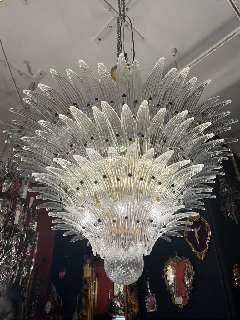Luxury Murano Palmette ceiling light made by 163 Murano trasparent glasses in a gold metal frame. Murano blown glass in a traditional way. Structure in gold colored metal.
Period: 1980's
Dimensions: 55,10 inches (140cm) height with chain; 31.50