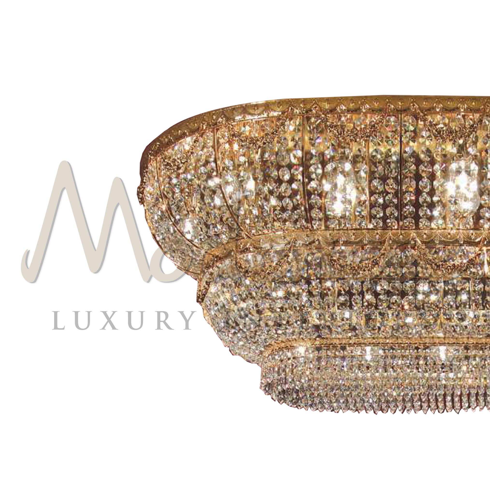Traditional Italian design and modern production techniques makeup the decorative appearance of the Modenese Gastone Luxury Interiors ceiling lamp. With its 24 kt gold plate and scholer crystals, this model is pure finesse. This model requires 20