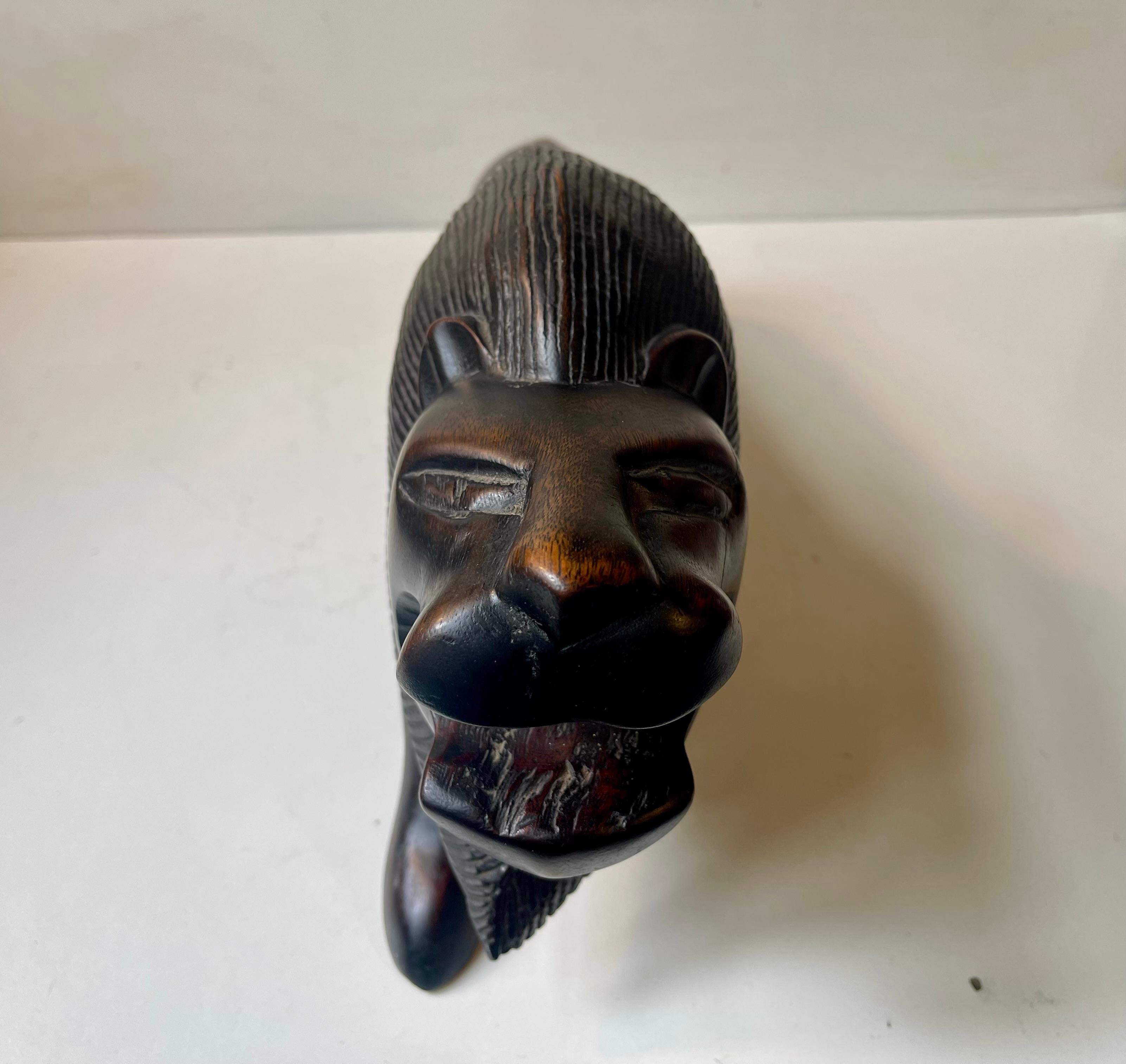 Majestic Lion Sculpture in Carved Dark Hardwood For Sale 1