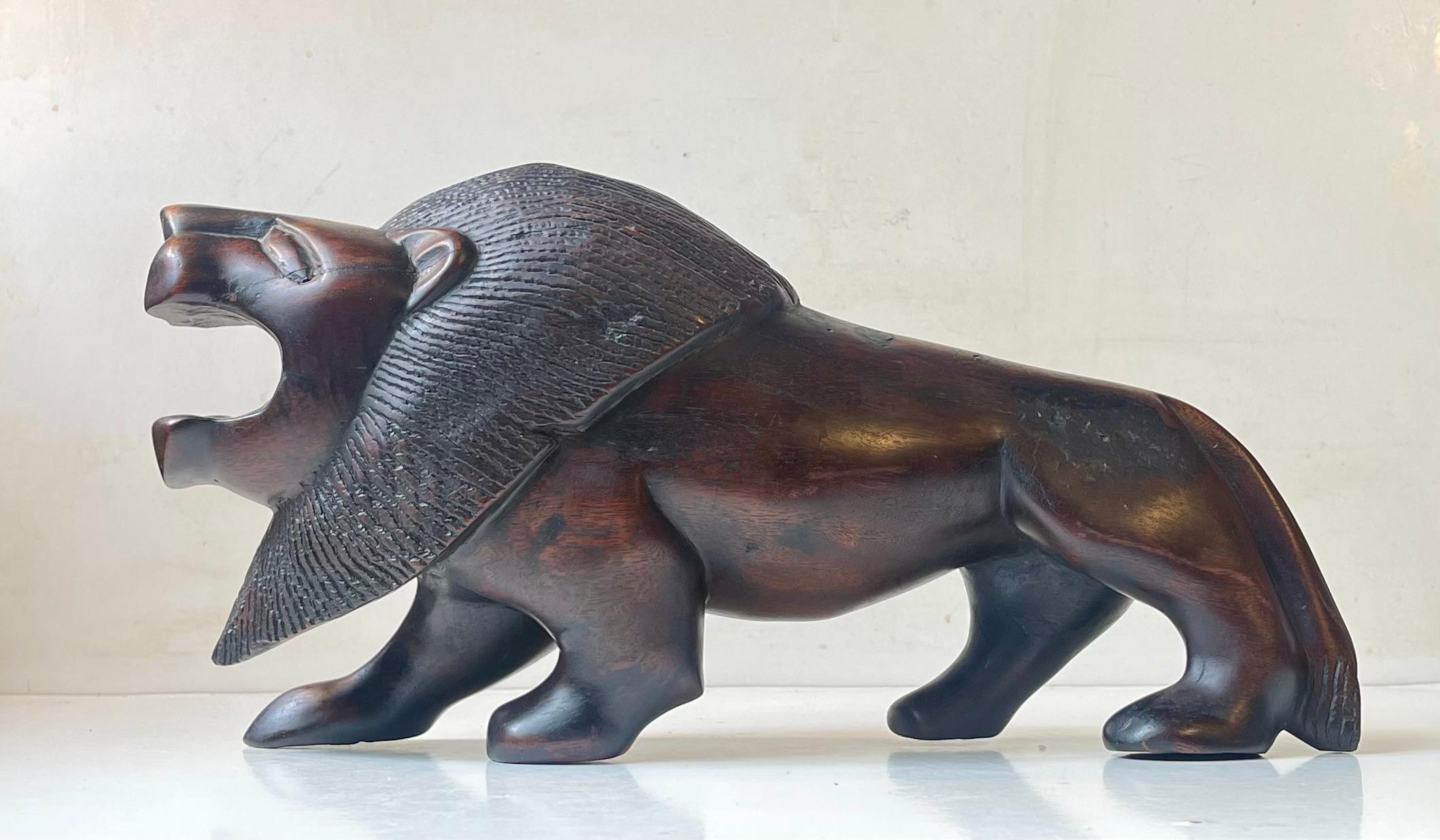Majestic Lion Sculpture in Carved Dark Hardwood For Sale 2