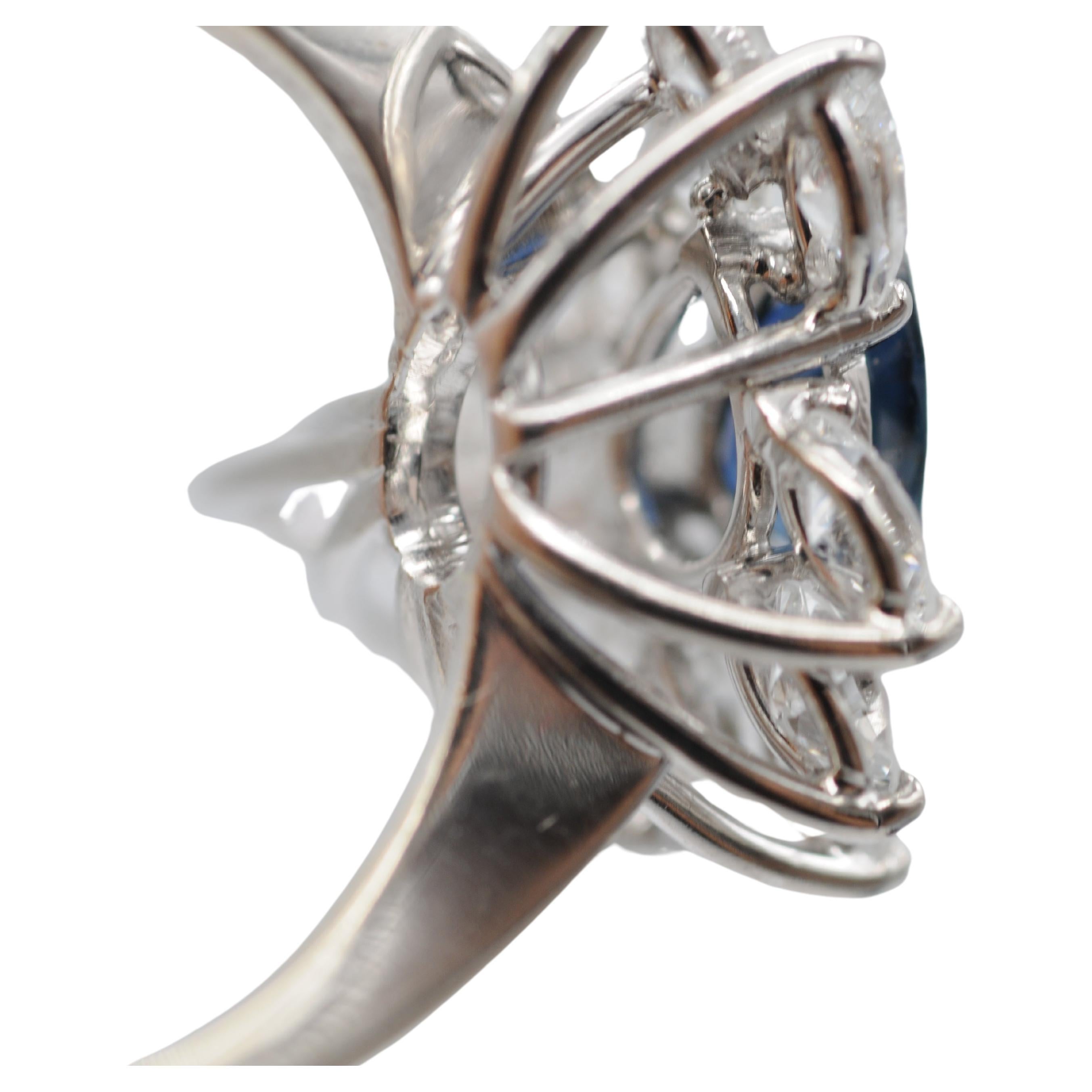 Majestic pear-cut sapphire with navette diamond-cut ring in 18k white gold. For Sale 8