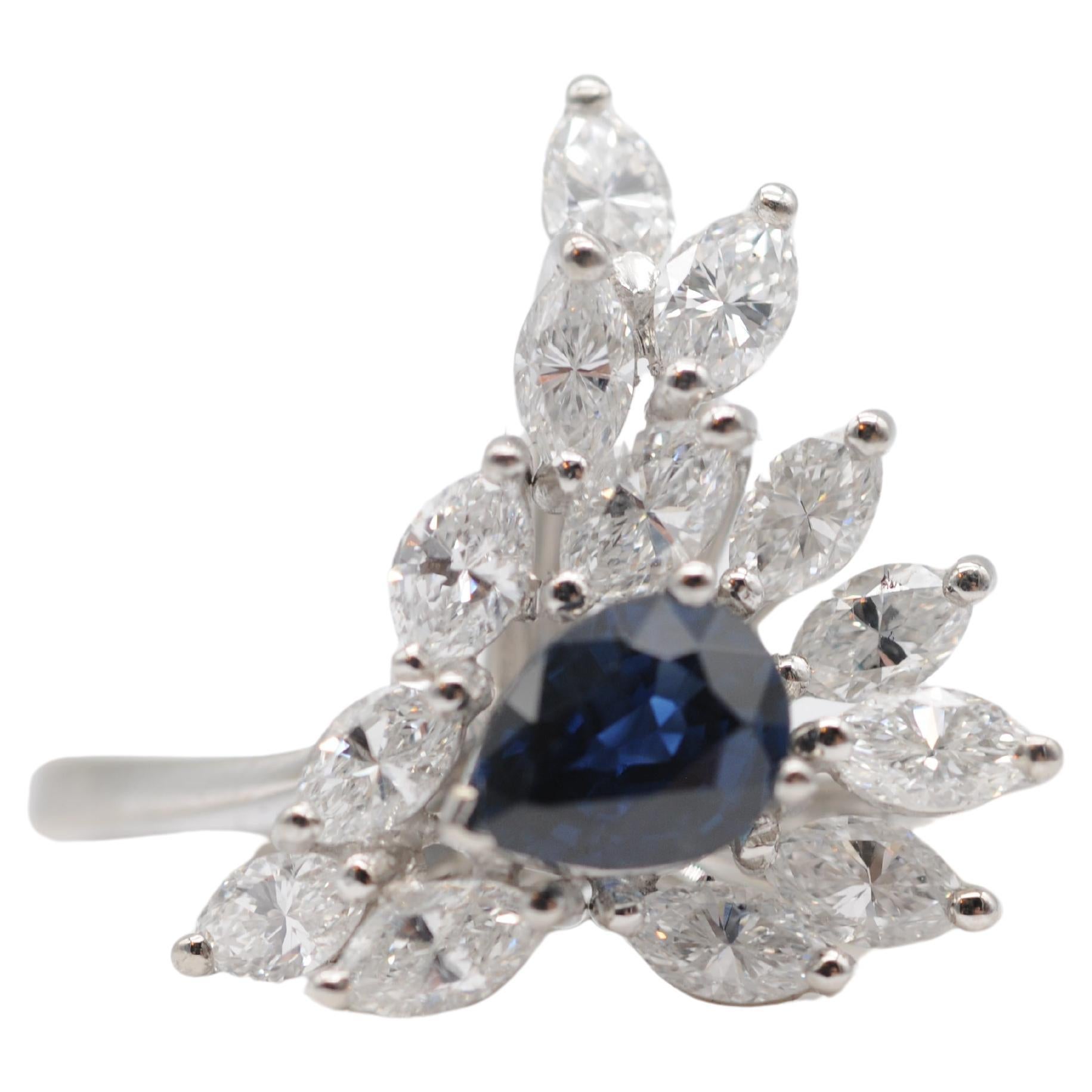 Art Deco Majestic pear-cut sapphire with navette diamond-cut ring in 18k white gold. For Sale