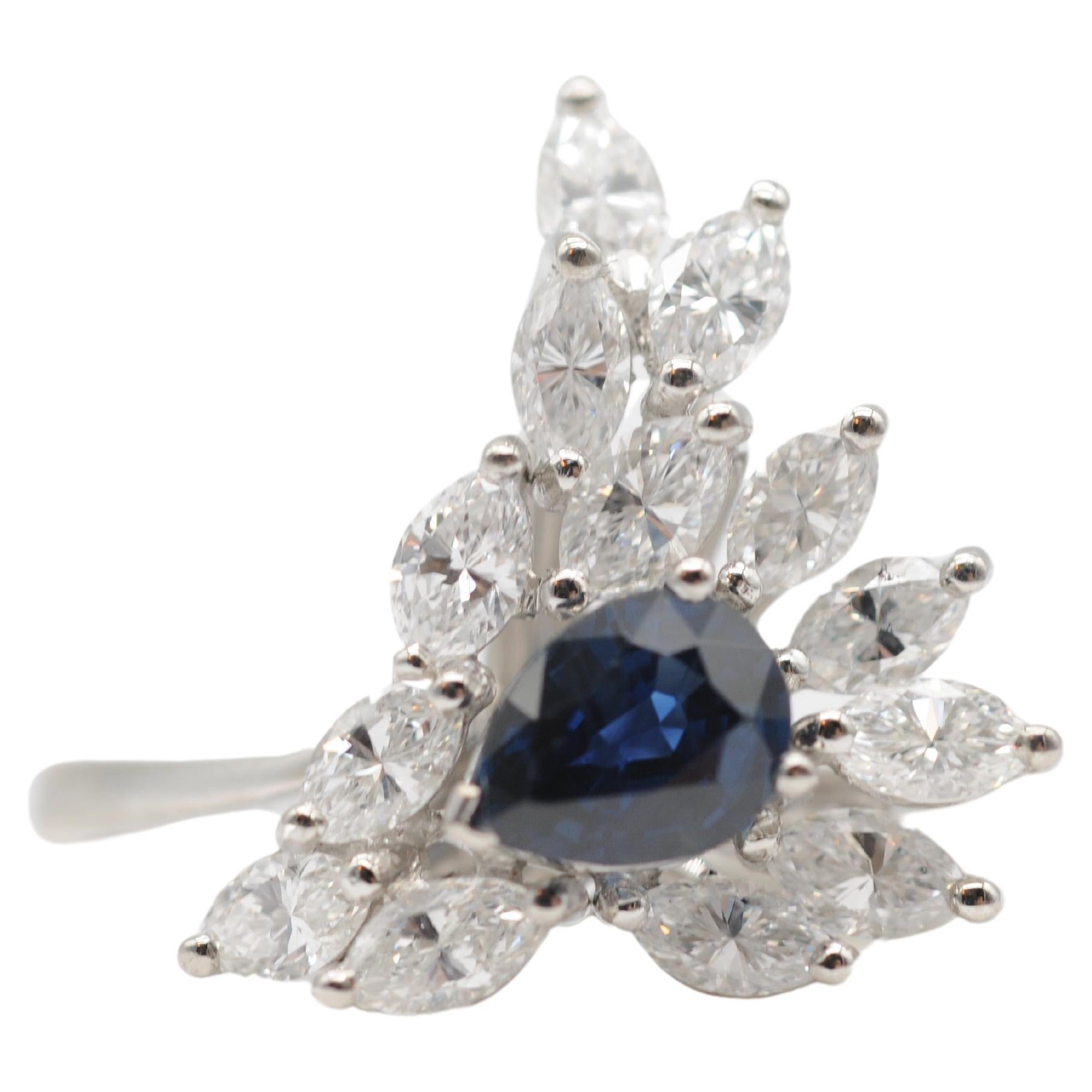 Pear Cut Majestic pear-cut sapphire with navette diamond-cut ring in 18k white gold. For Sale