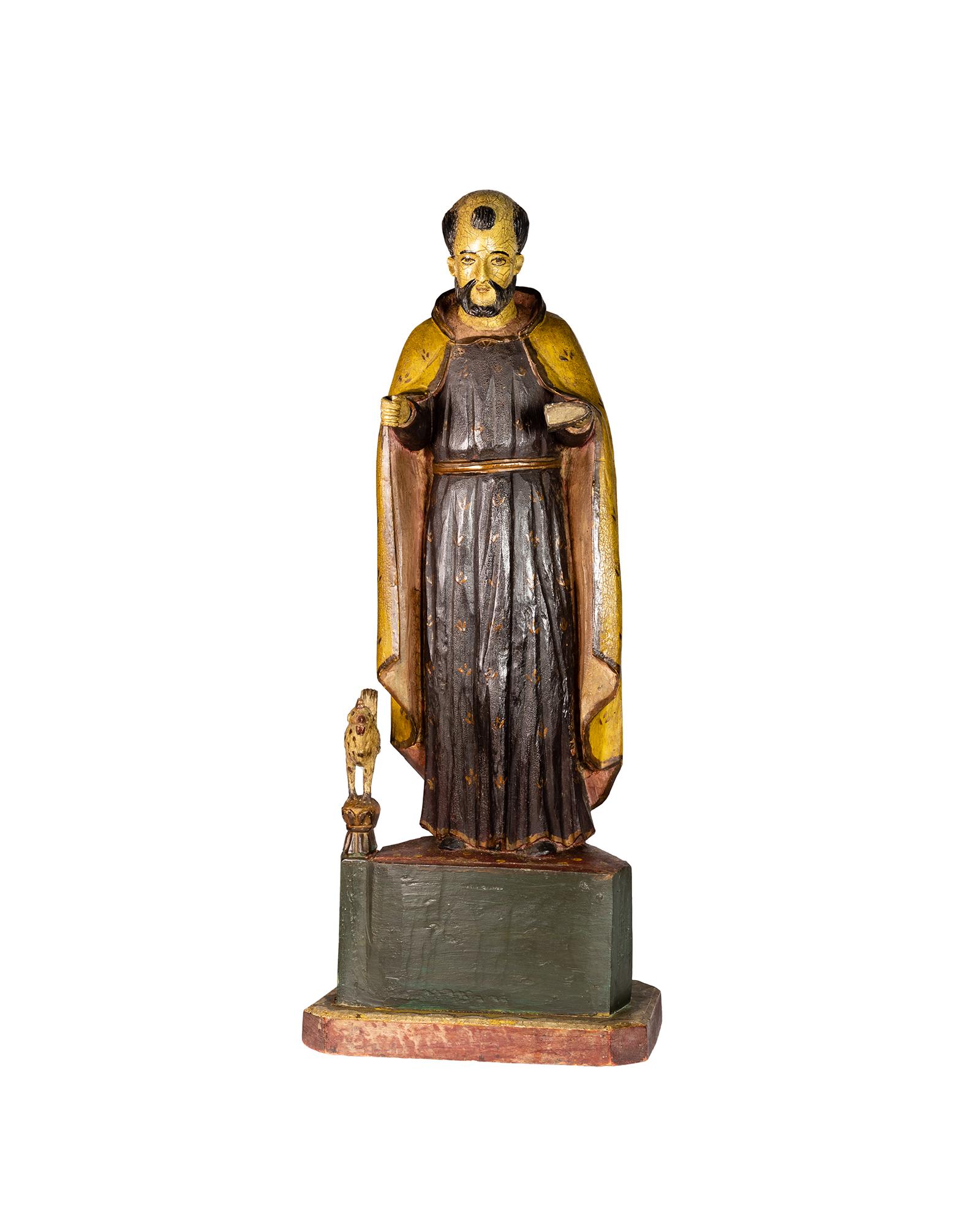 Questa statua in legno policromo di San Benedetto del XX secolo emana un'aura di tranquillità e saggezza che la rende un pezzo d'arte sacra molto apprezzato. 
Alta 84 cm, la statua raffigura San Benedetto che tiene in mano il Libro della Regola e un