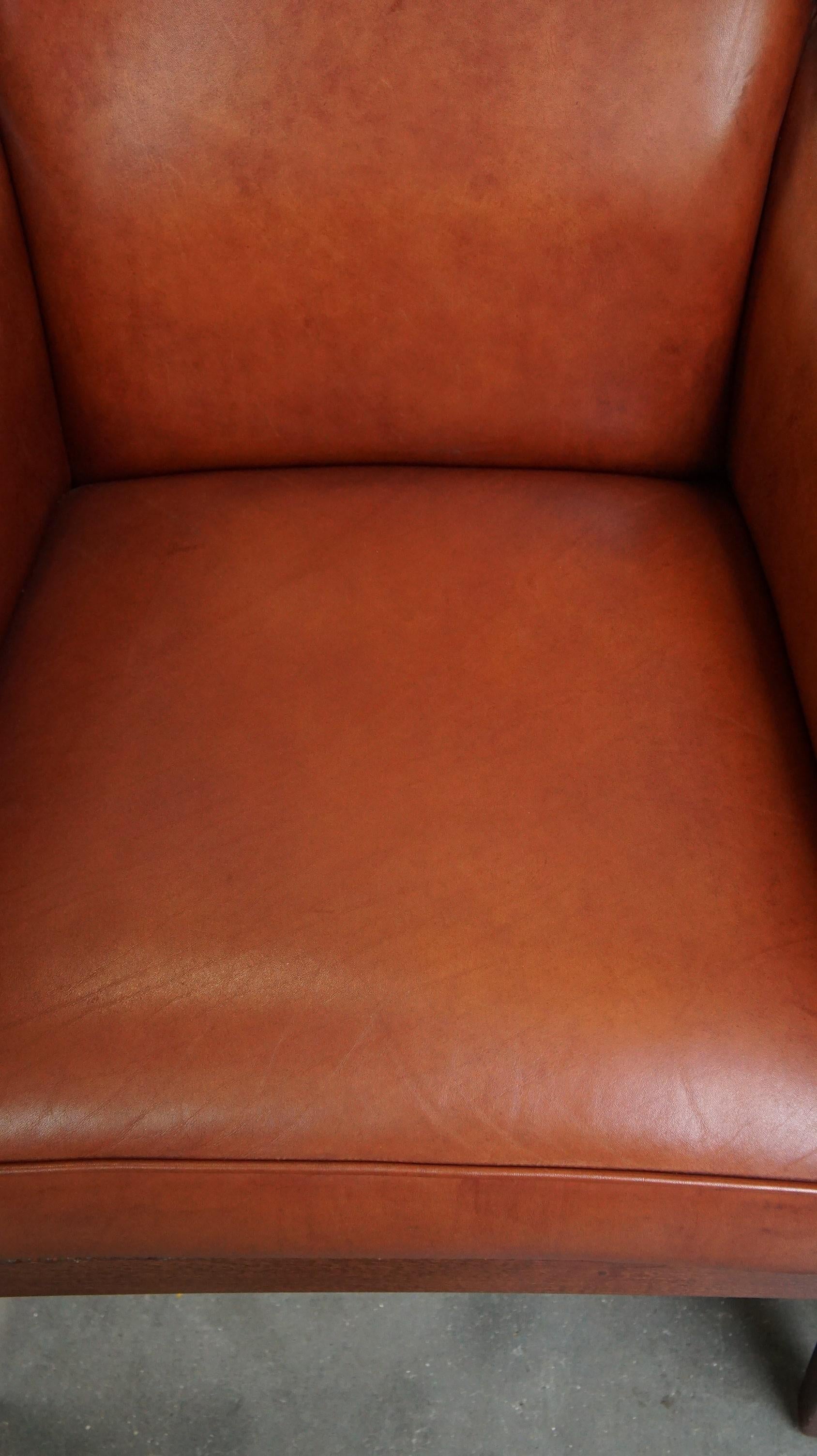 XX secolo Majestic set di 2 poltrone in pelle di mucca color cognac dal design Art Deco in vendita
