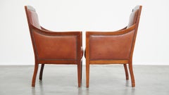 Majestic, set of 4 cognac-colored cow leather Art Deco design armchairs
