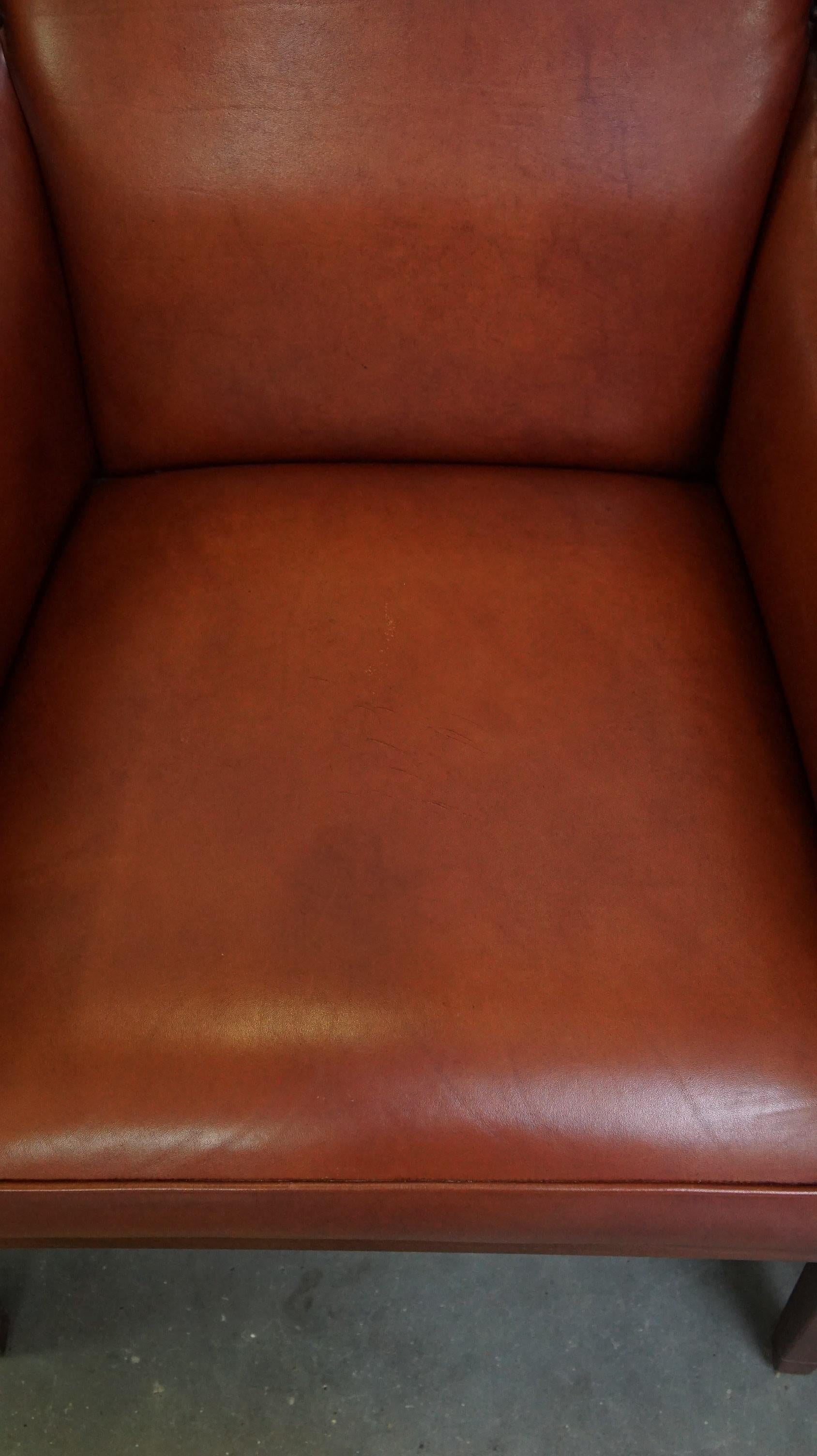 Majestic, set di 4 poltrone in pelle di mucca color cognac dal design Art Deco In condizioni discrete in vendita a Harderwijk, NL