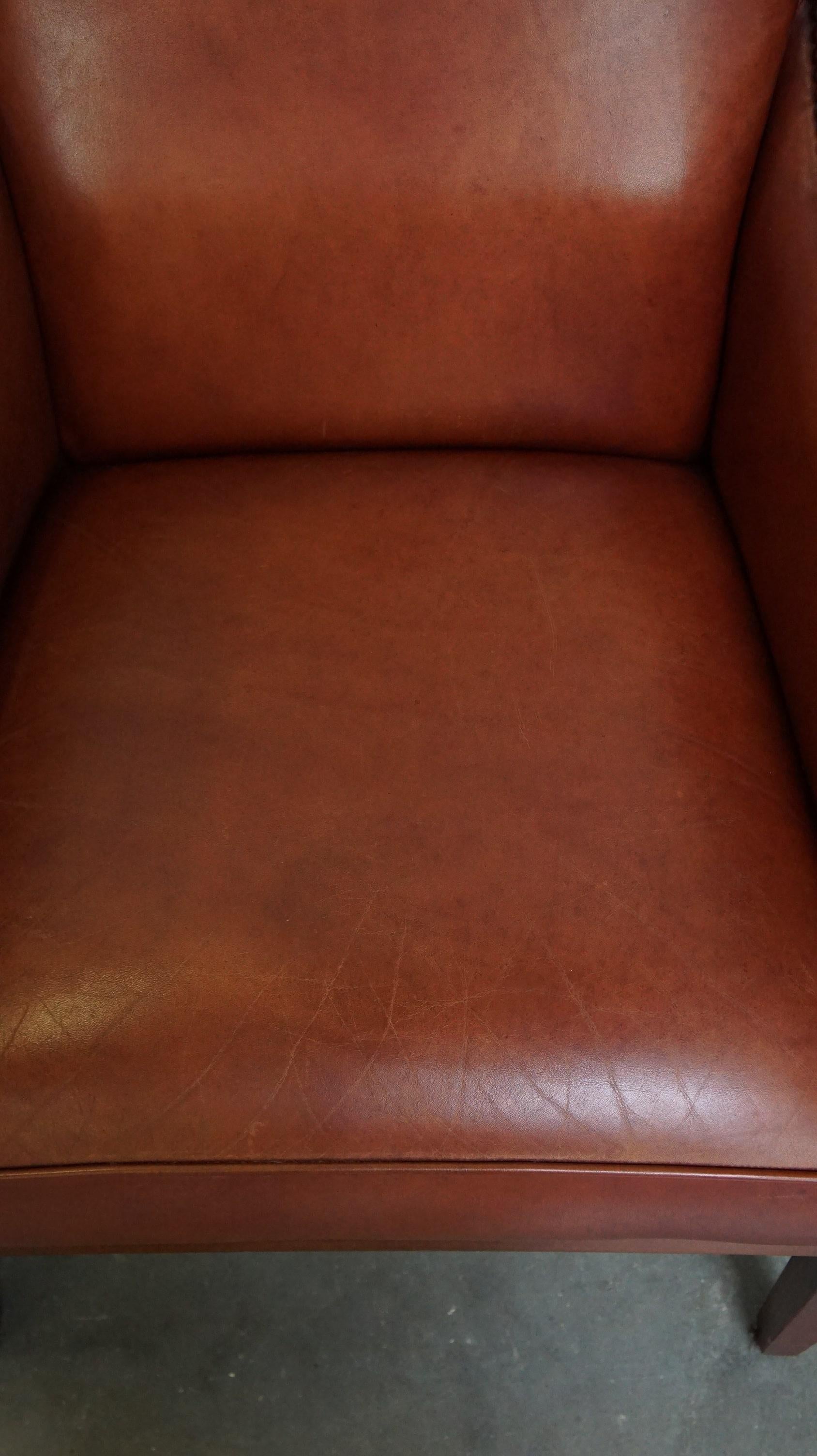Vacchetta Majestic, set di 4 poltrone in pelle di mucca color cognac dal design Art Deco in vendita
