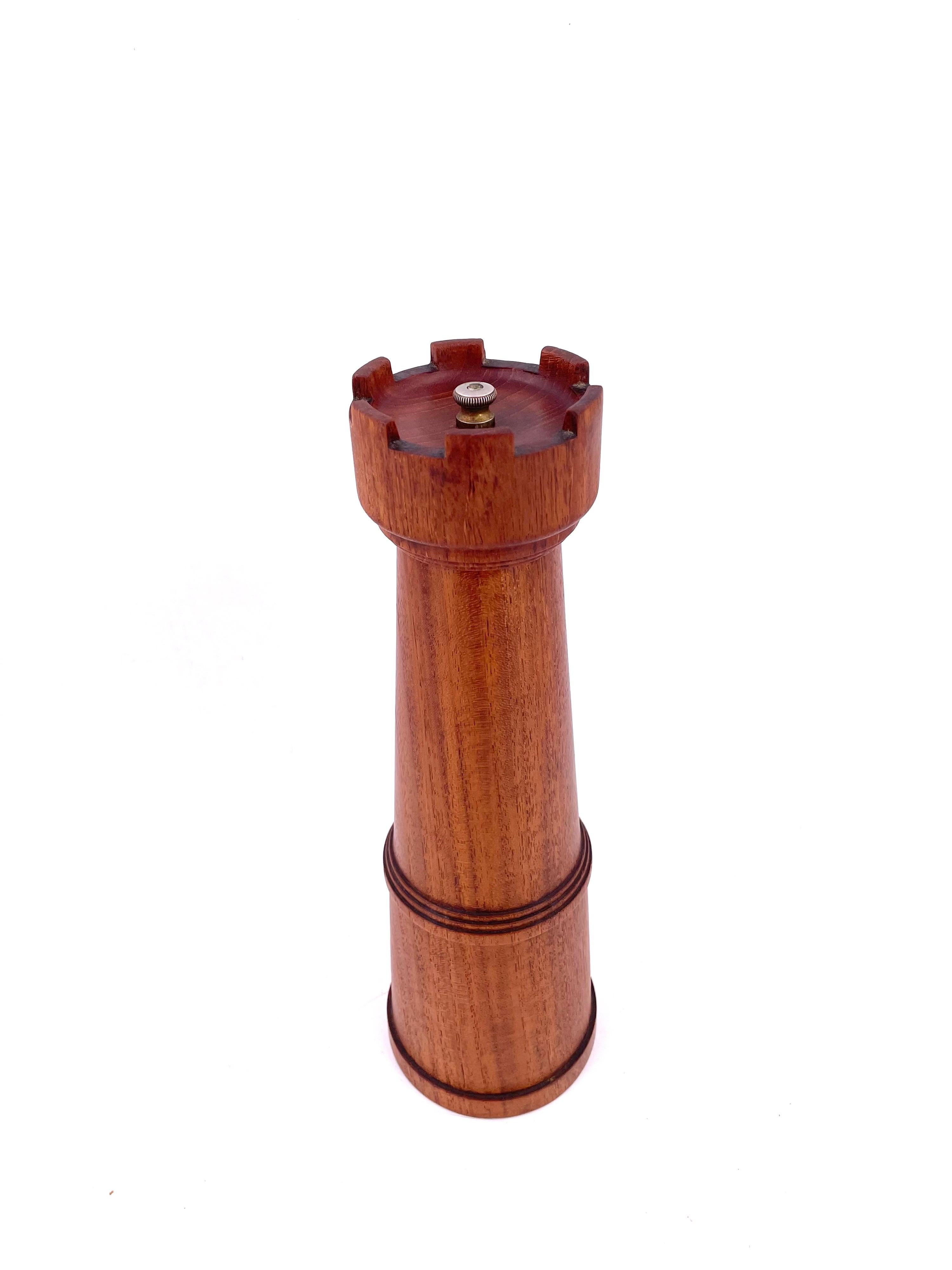 Beautiful tall unique rare tall solid teak 1950's chess tower, pepper shaker with English metal mechanism by Galatix we have oiled and cleaned the piece.
