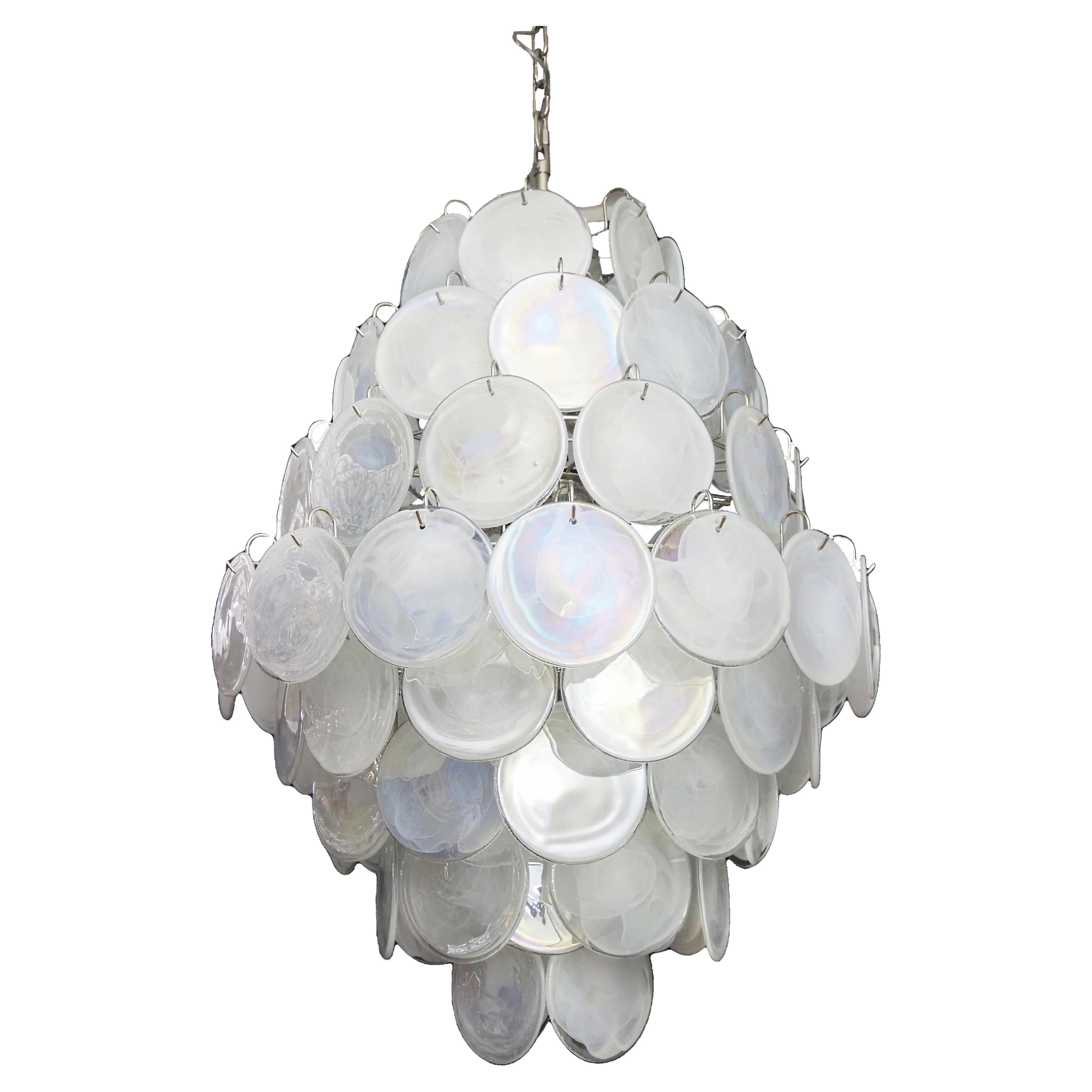 Vintage Italian Murano chandelier in Vistosi style. The chandelier has 87 fantastic white alabaster iridescent glasses in a nickel metal frame.
Period: late XX century
Dimensions: 67,80 inches (175 cm) height with chain; 40,70 inches (105 cm) height