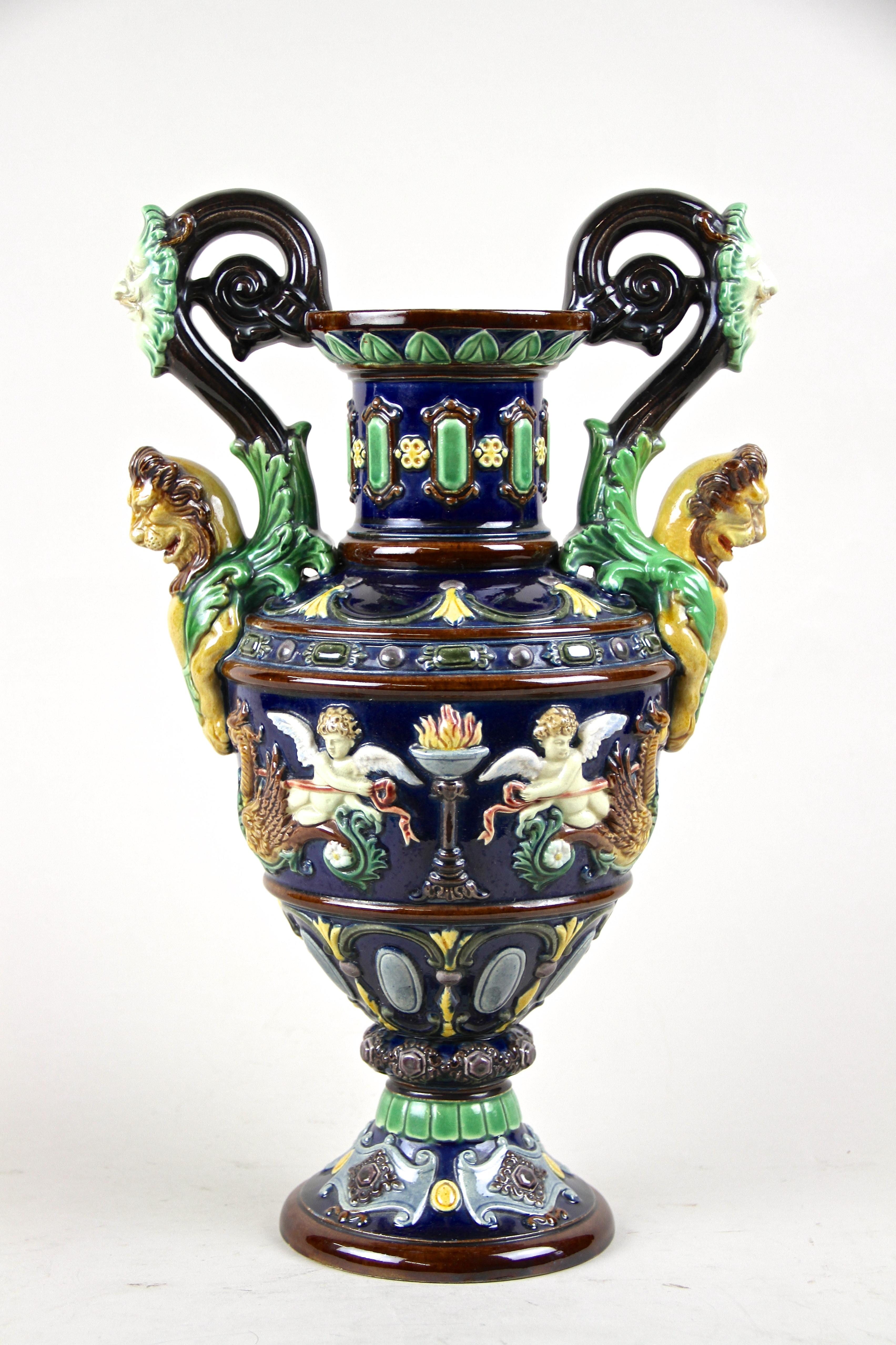 Superb late 19th century majolica amphora vase by Johann Maresch. Elaborately made around 1870 in the famous workshops in Bohemia, this very rare, masterful piece of majolica art impresses with an outstanding design. The bulbous shaped body colored