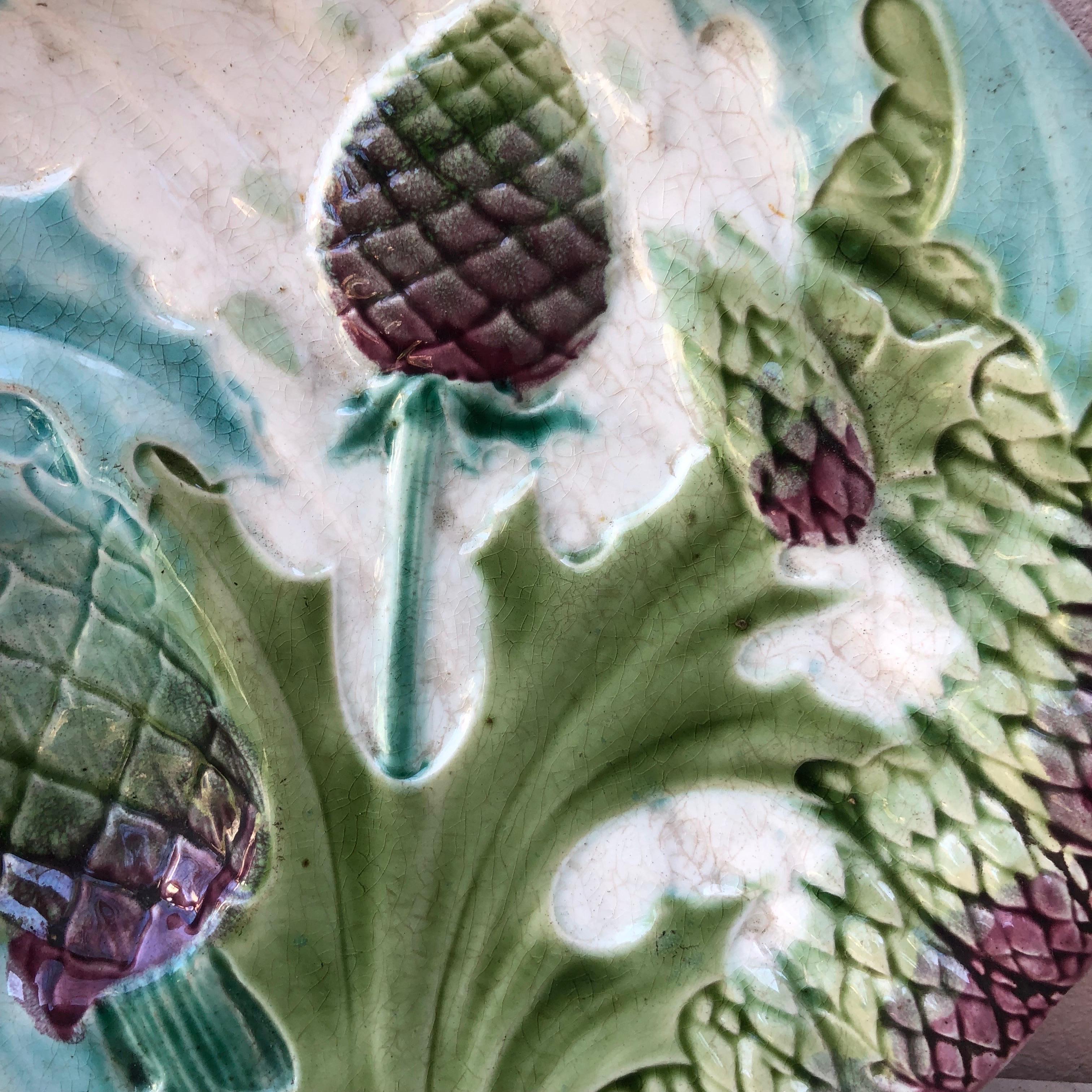 Majolica asparagus plates signed Luneville Keller et Guerin, circa 1890.
 