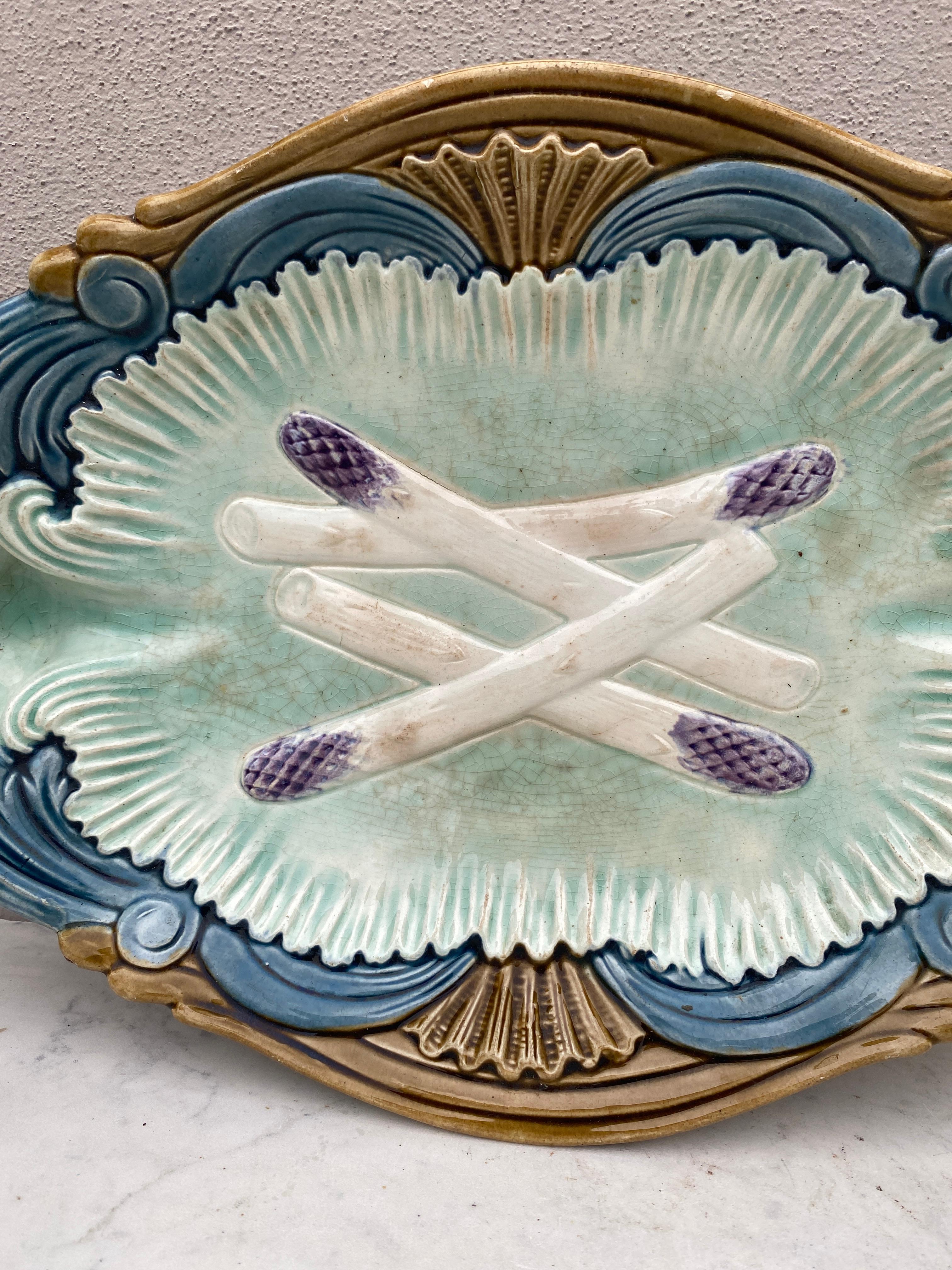 French Majolica asparagus platter Orchies.
(North of France), circa 1900
Every important French manufactures produced at the end of the 19th century  asparagus and artichoke sets.
  