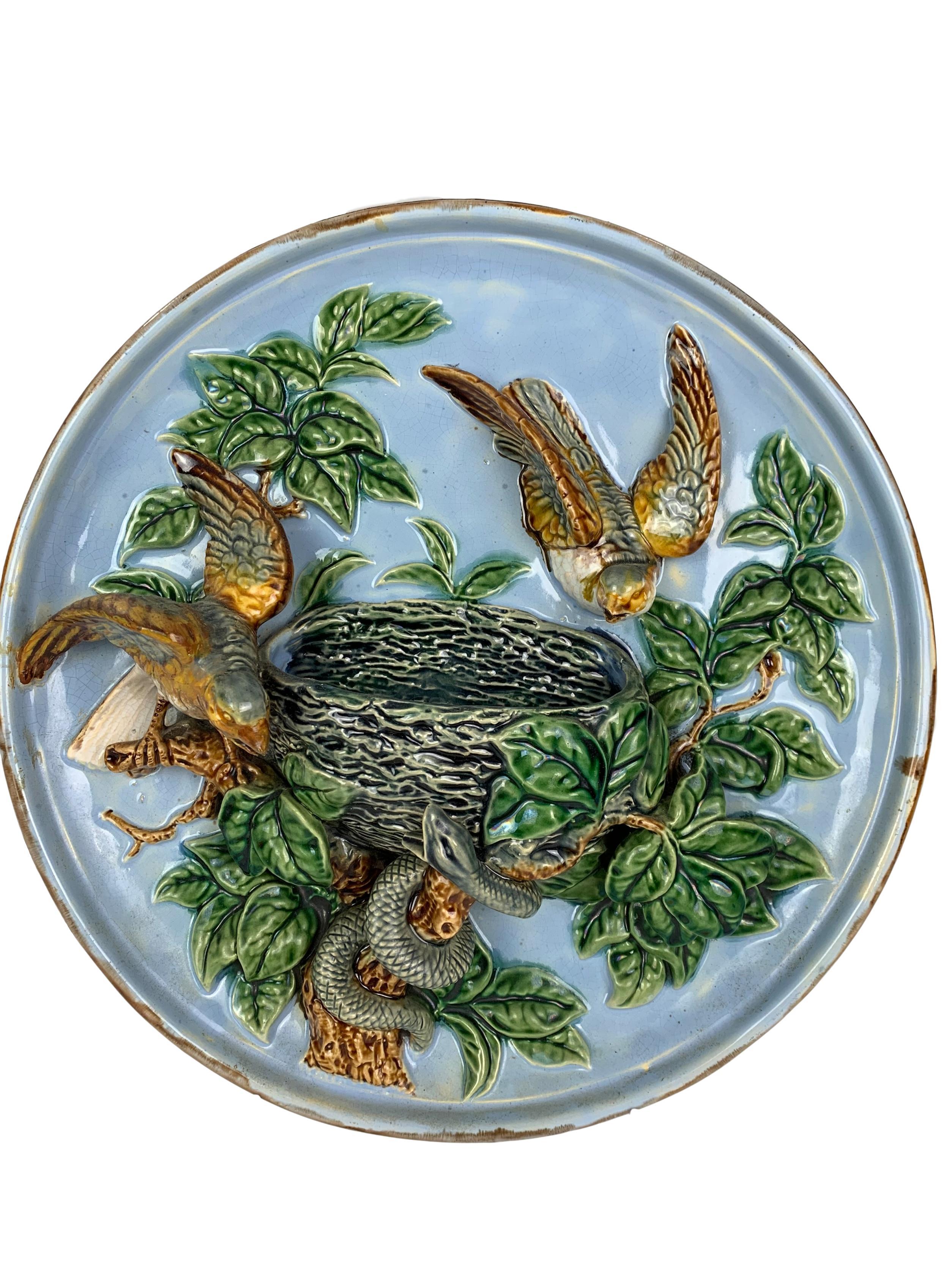 Majolica birds, nest and snake wall pocket plaque, circa 1880. Ginori Factory, Italy. Wing has been restored.