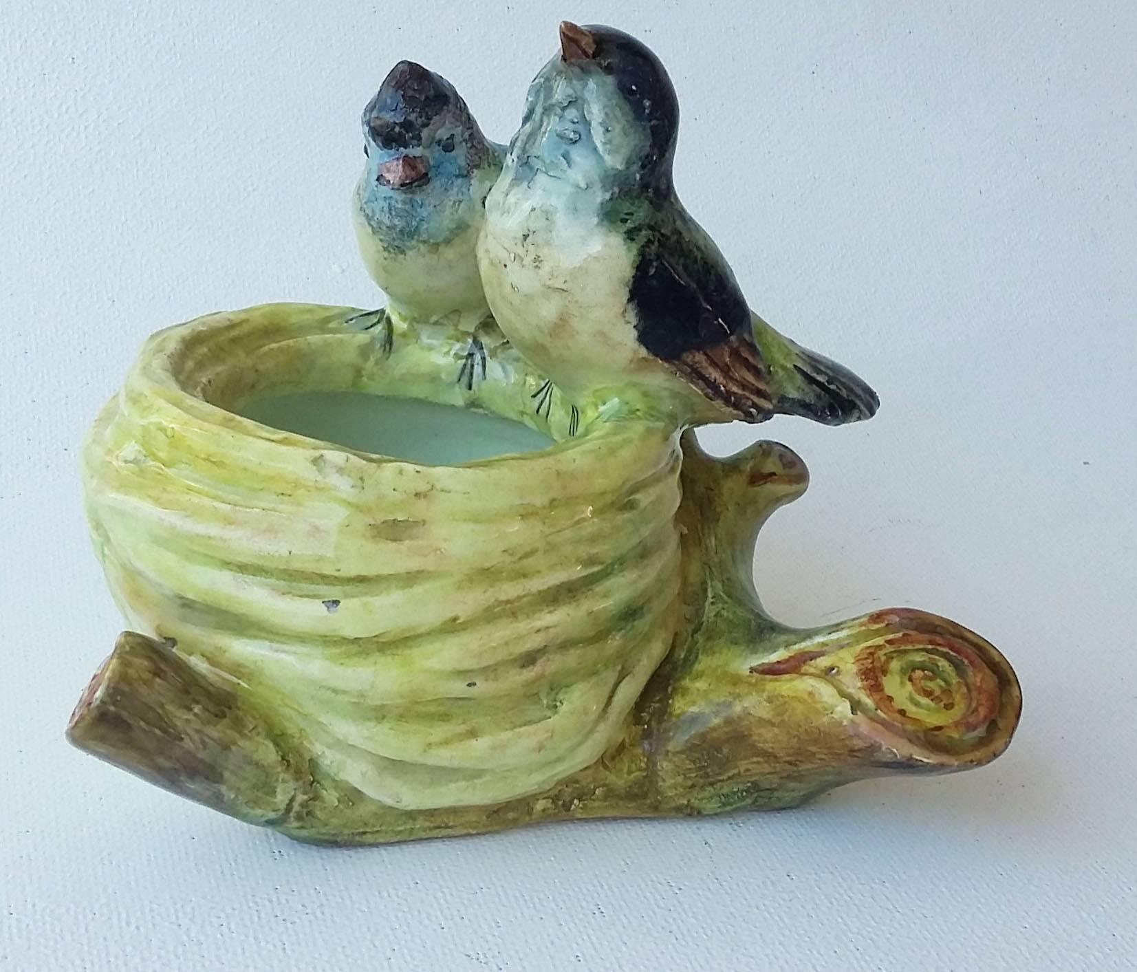 Charming Majolica nest with two birds signed Delphin Massier Vallauris, circa 1890.
Naturalist movement.