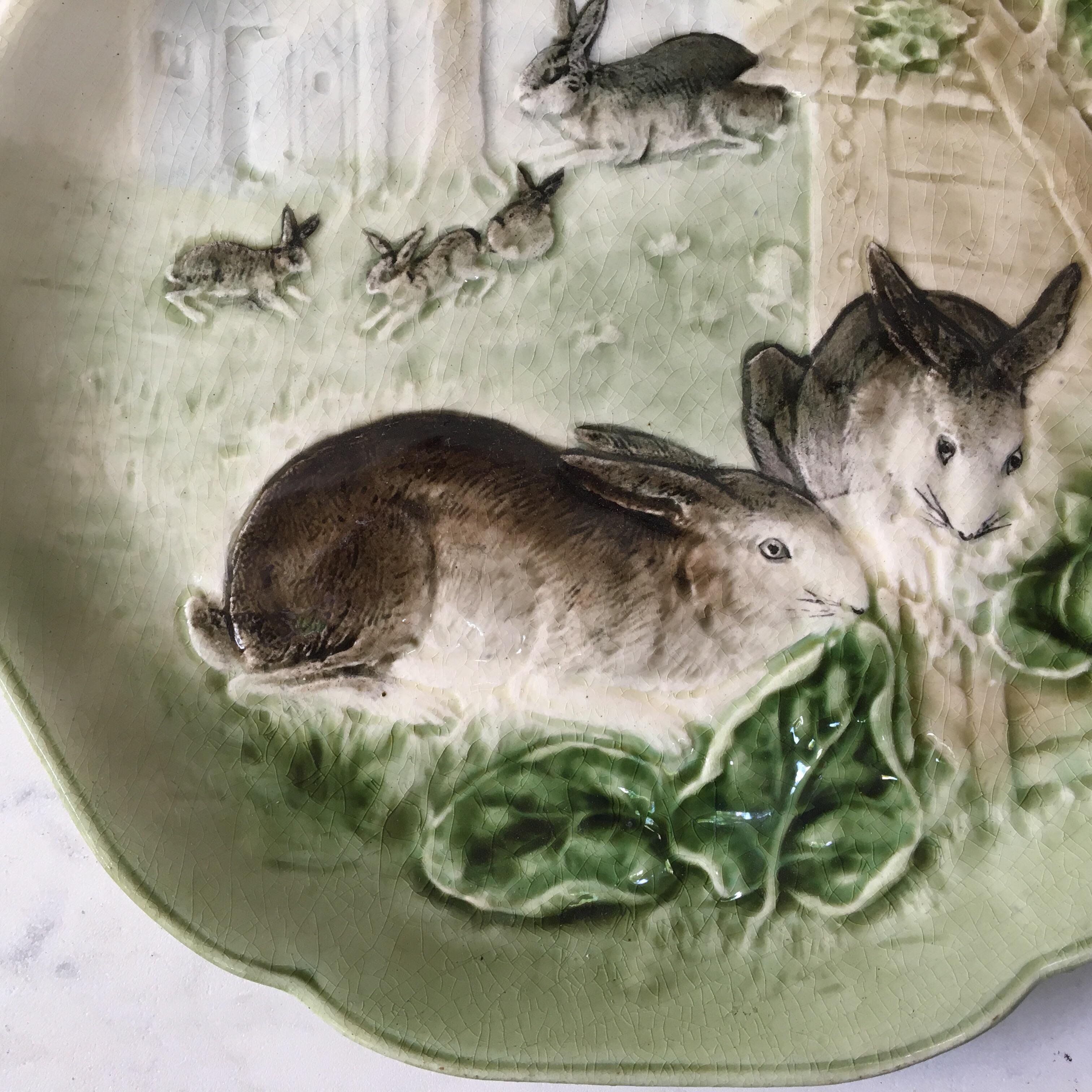Lovely and charming French Majolica plate with rabbits family eaten cabbage signed Choisy le Roi, circa 1880 (Plates made for Higgins and Seiter
New York).