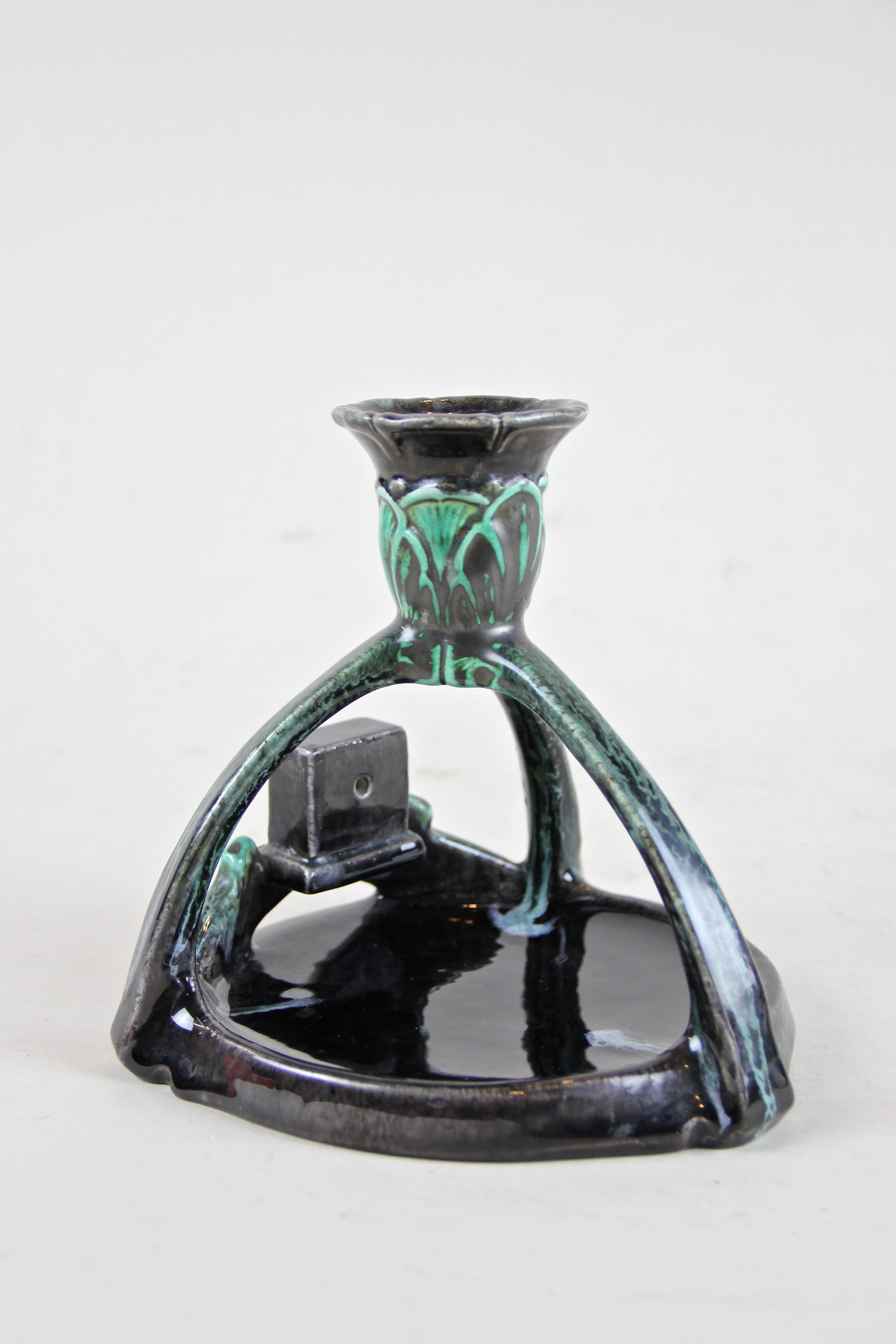 Rare Majolica candleholder by Wilhelm Schiller & Son from the early Art Nouveau period, circa 1900. Designed in a timeless, modern style, just remember that this piece is nearly 120 years old, this antique Majolica item impresses with its