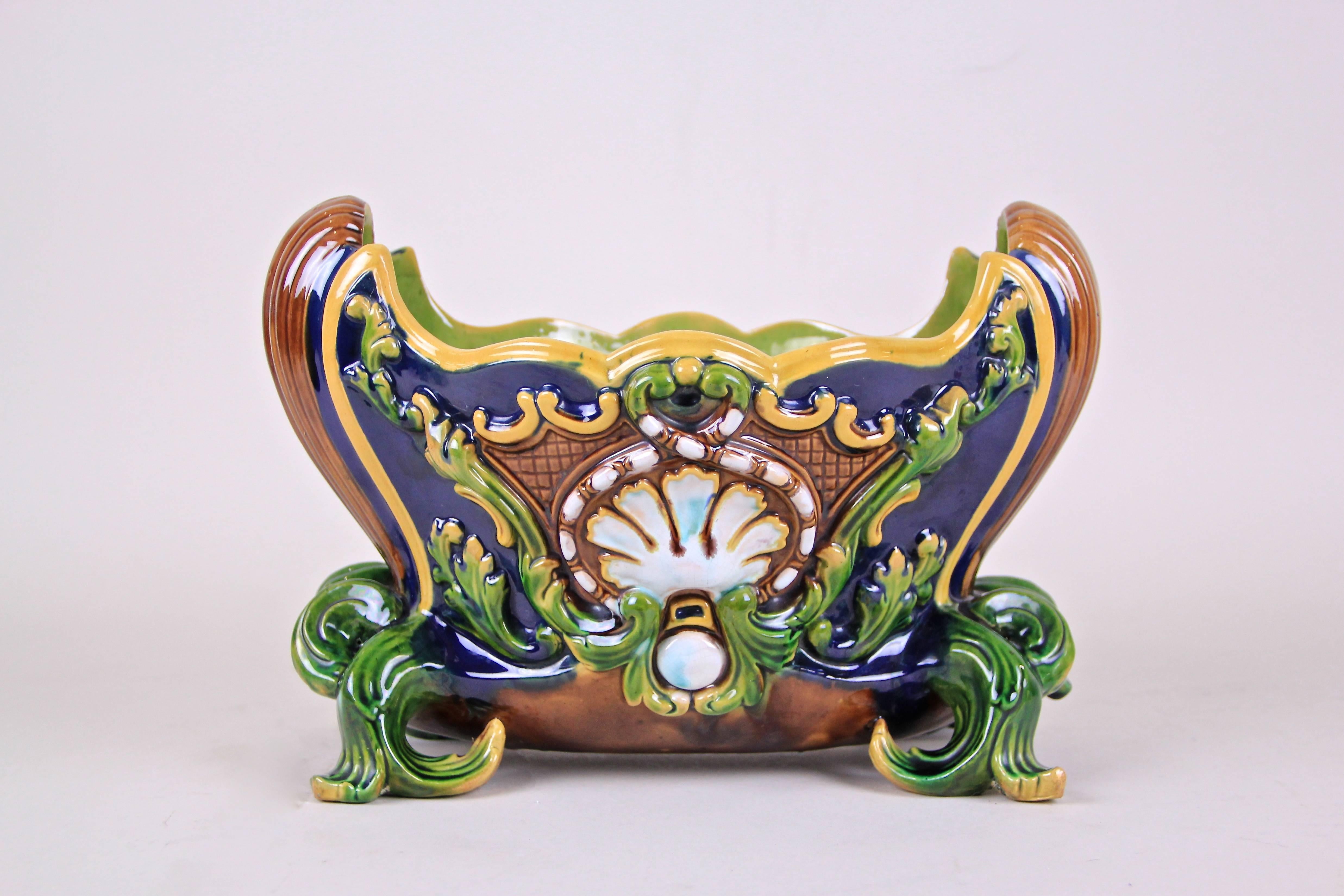 Charming Majolica centerpiece or Jardinière from the renowned company of Wilhelm Schiller & Son in Bohemia from circa 1890. This fantastic designed piece of majolica shows a gorgeous floral design in combination with great color compositions from