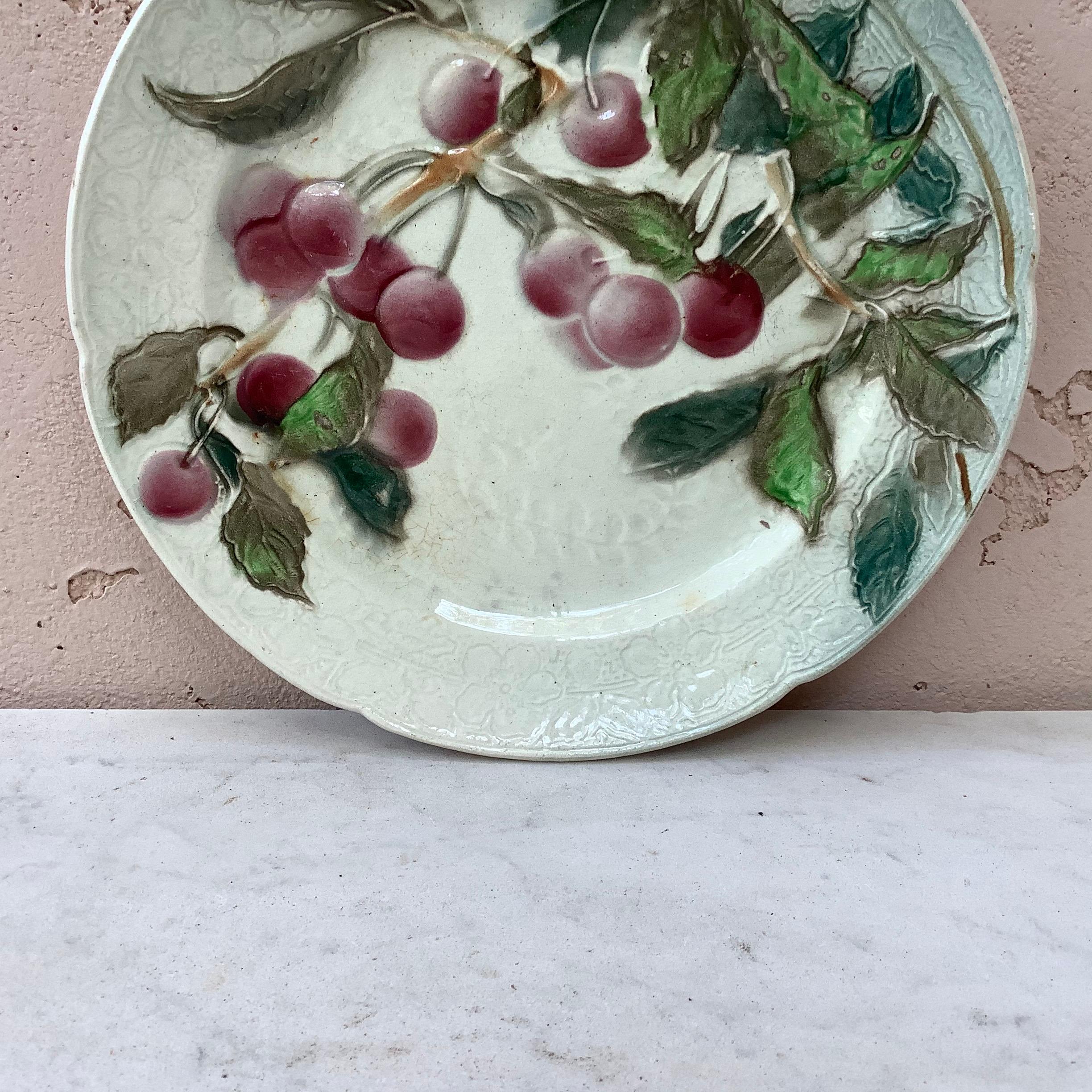 Majolica cherries plate Keller & Guerin Saint Clément, circa 1900.
   