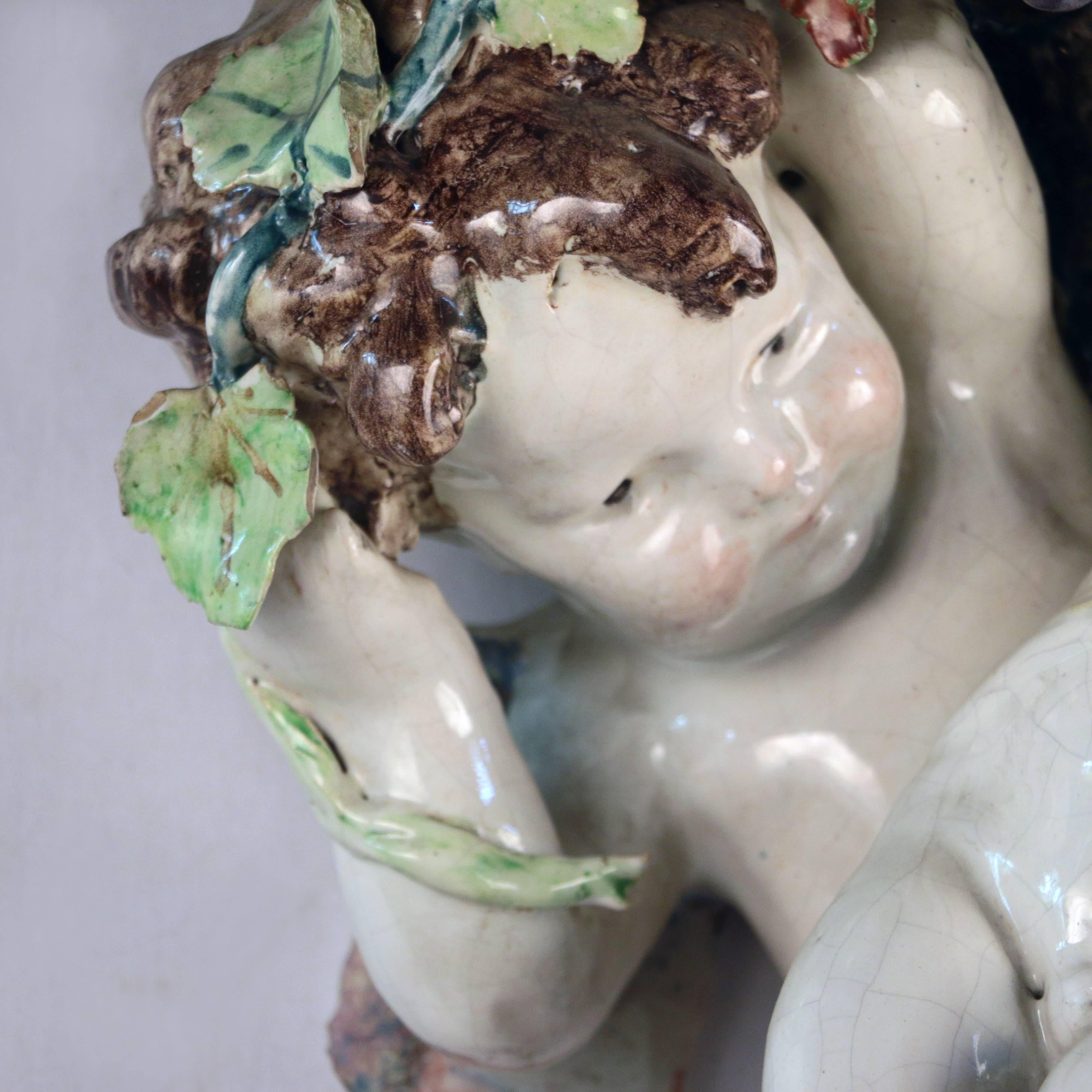 19th Century Majolica Cherubs supporting Wall Bracket