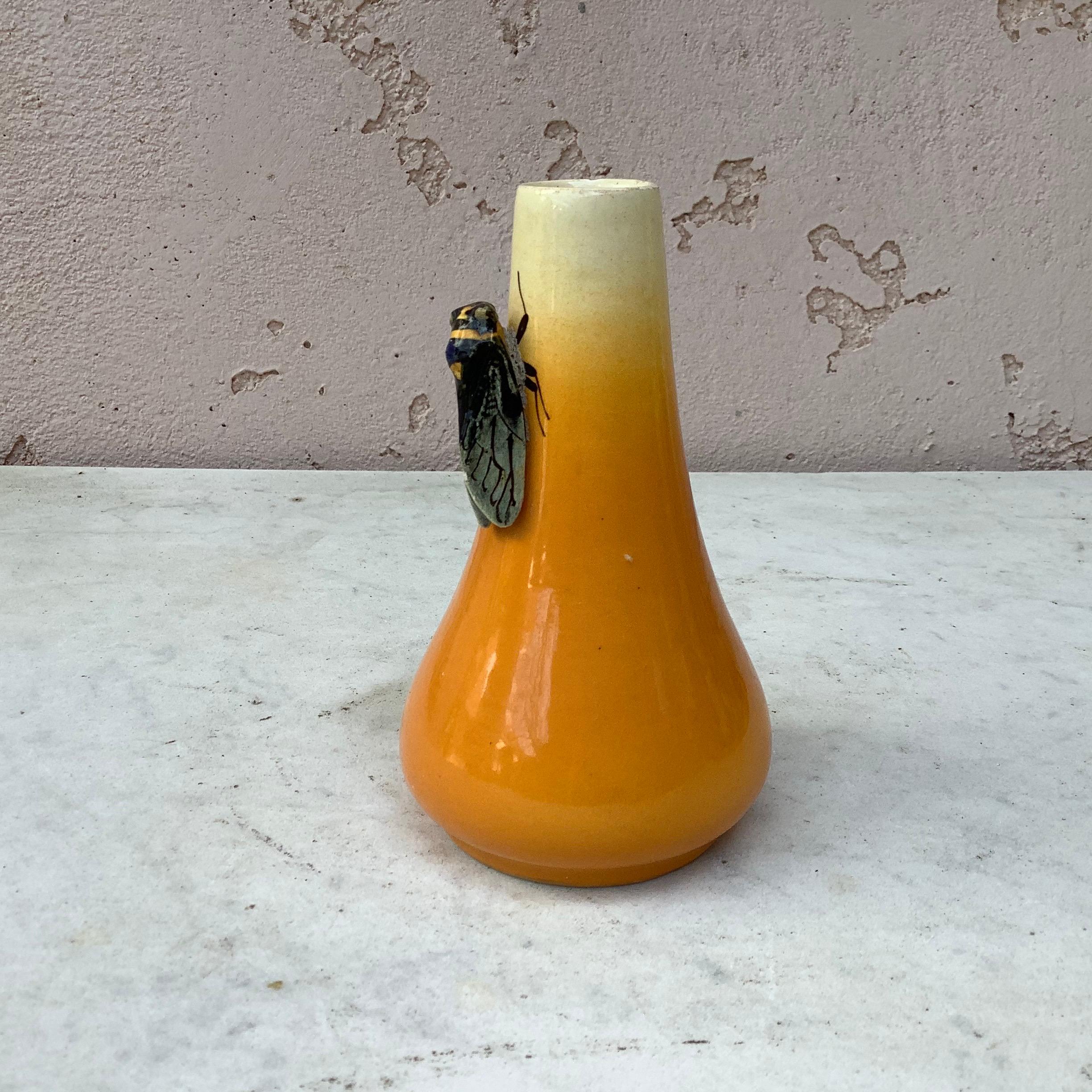 Small yellow Majolica vase with cicada signed Sicard, circa 1950.
Provençal style.

  
