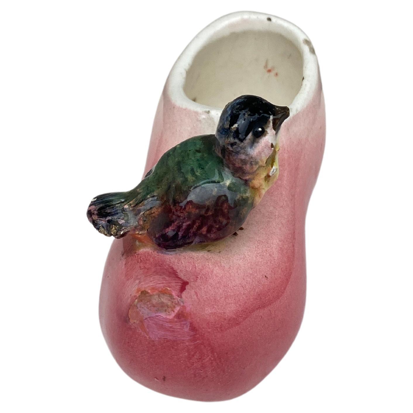 Charming Majolica pink clog with 1 bird signed Jean Massier circa 1890.
H / 2.5 inches , L / 4.5 inches.
The Massier family produced different pieces with birds in a very creative style in Vallauris on the French Riviera, they excelled in the