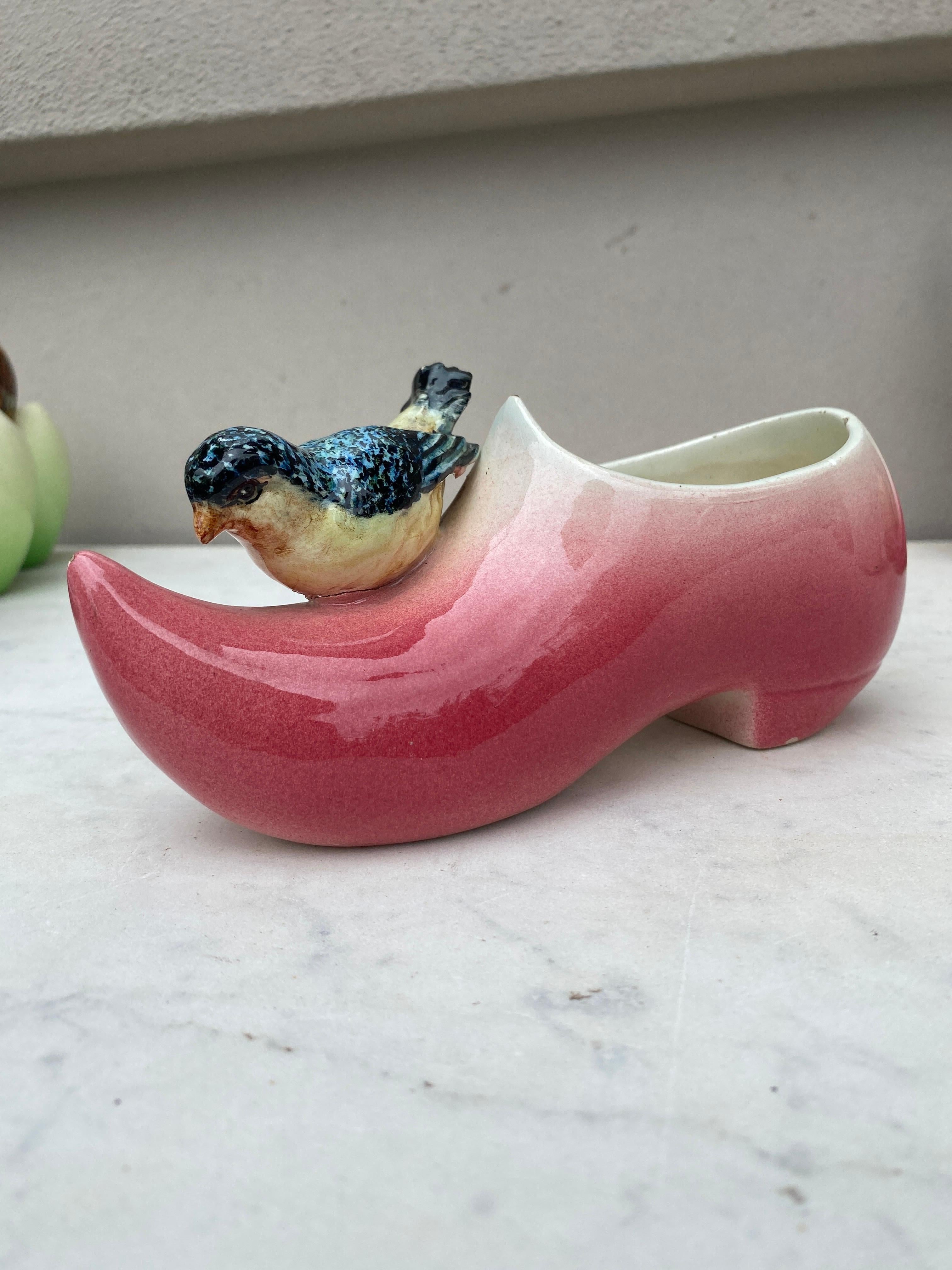 Charming Majolica pink clog with a bird Delphin Massier circa 1890.
H / 3.5 inches , L / 7 inches.
The Massier family produced different pieces with birds in a very creative style in Vallauris on the French Riviera, they excelled in the