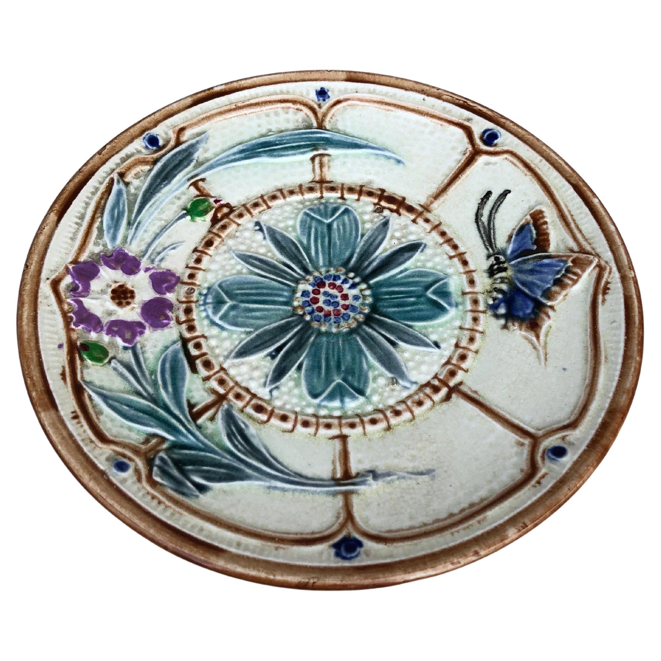Majolica flowers and butterfly plate Wasmuel circa 1890.
