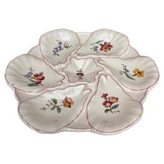 Piatto da ostrica in maiolica Flowers Longchamp, 1900 circa