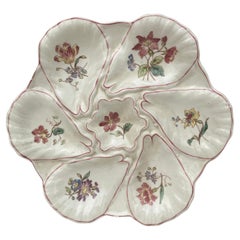 Assiette à huîtres à fleurs en majolique Longchamps, vers 1900