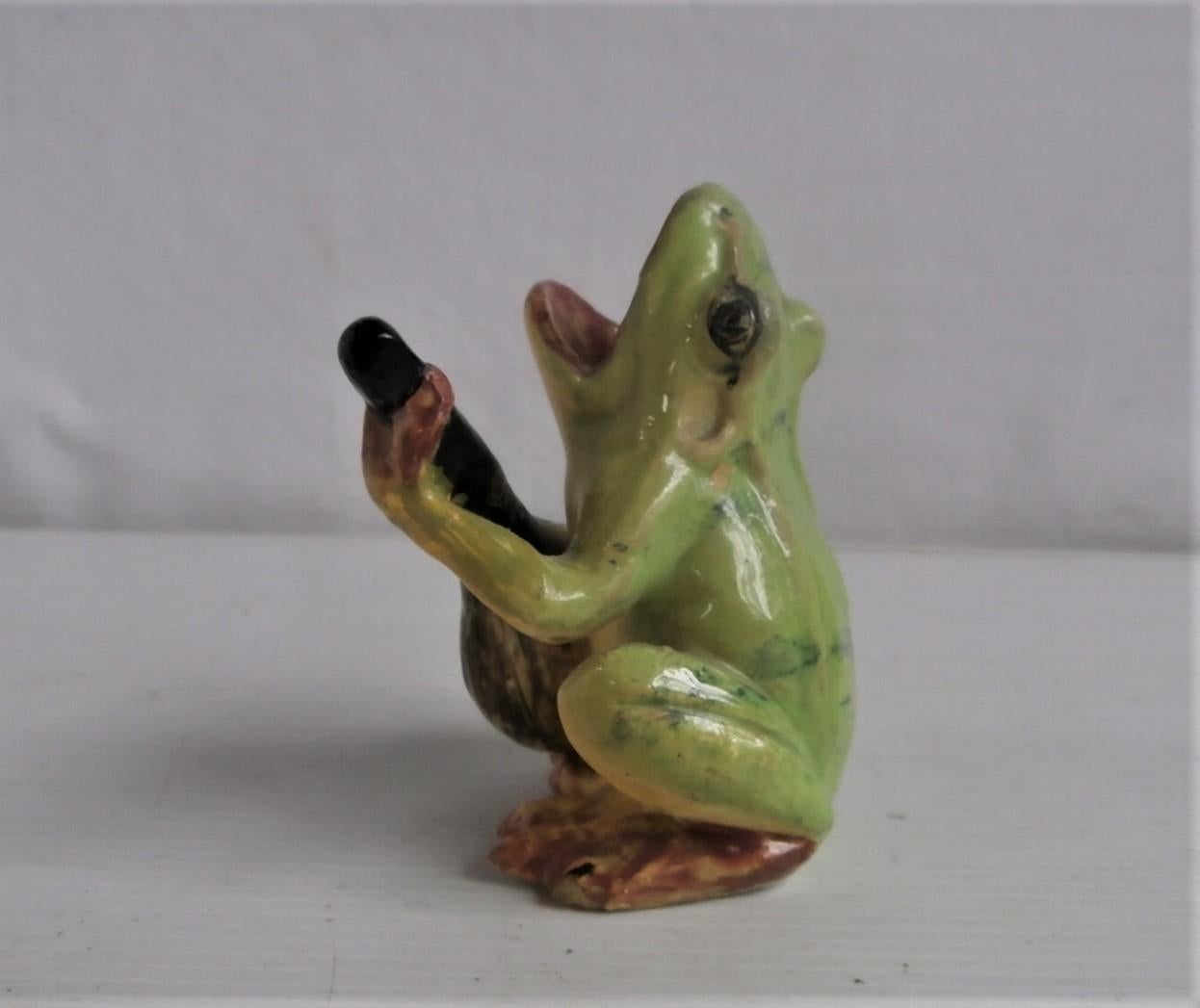 Art Nouveau green Majolica frog who playing mandolin unsigned Jerome Massier Fils, circa 1900.
The Massier are known for the quality of their unique enamels and paintings. The Massier family produced differents pieces with birds in a very creative