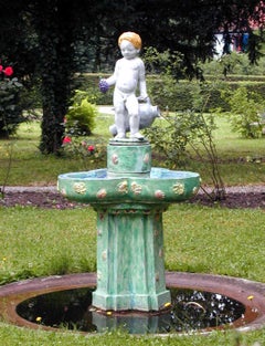 Majolica garden fountain - pedestal with basin and figure of a boy