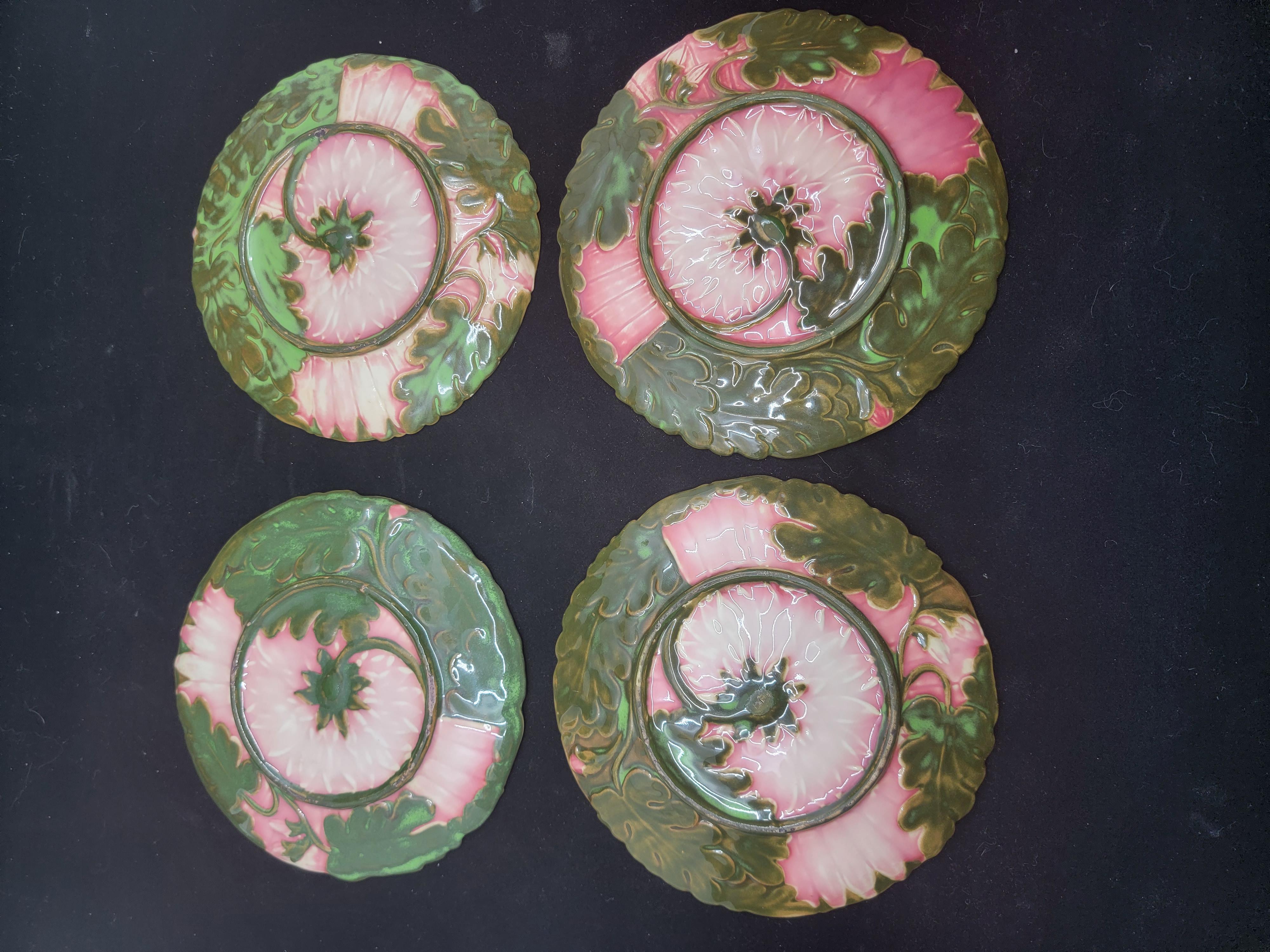 This is one of the rarest of majolica sets of dishes that I have come across. I enjoy small details . These four dishes represent the growing stages of a flower. They are graded in color. I have never seen that in a set before in all the years of