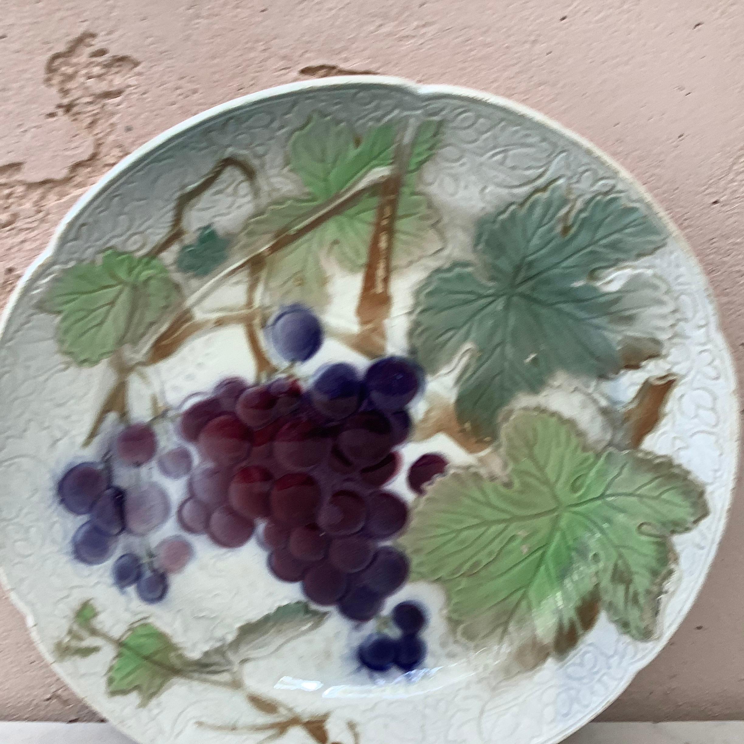 Majolica grapes plate signed Keller & Guerin Saint Clement, circa 1900.