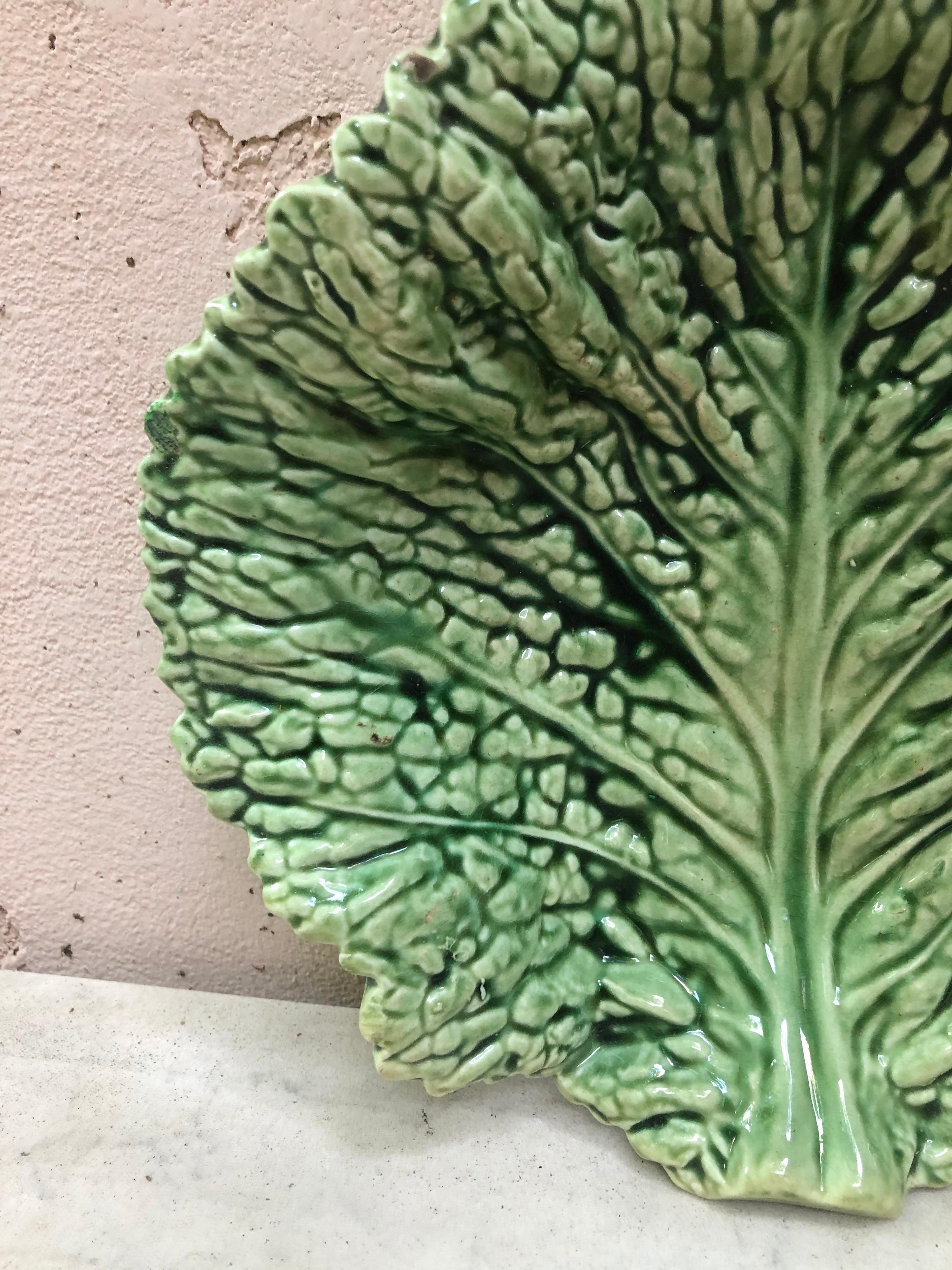 Green Majolica cabbage leaf platter, circa 1930 signed Sarreguemines.
  