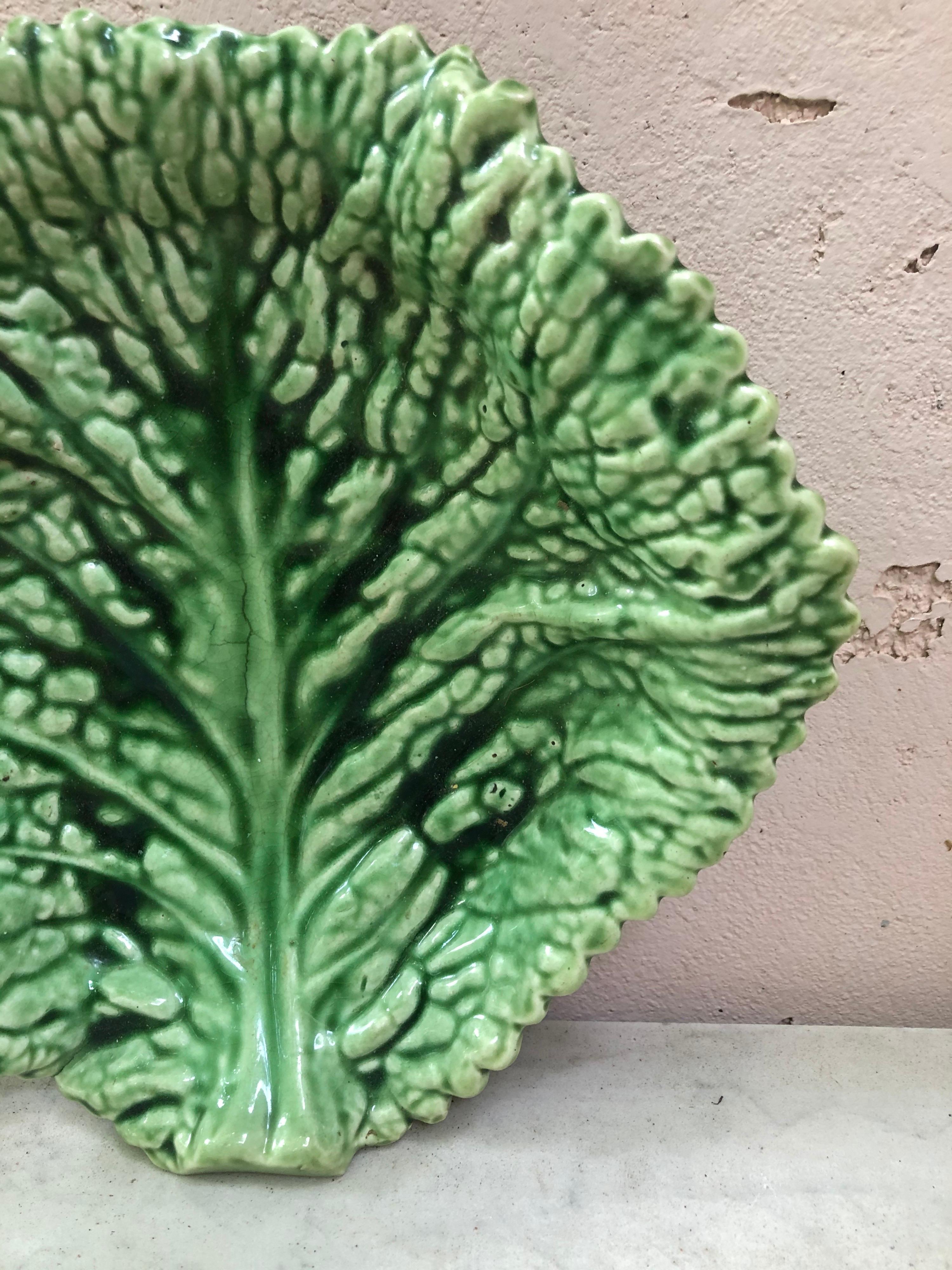 Green Majolica cabbage leaf platter, circa 1930 signed Sarreguemines.
 