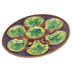 Majolica green oyster plate , early 20th century, brown and green color