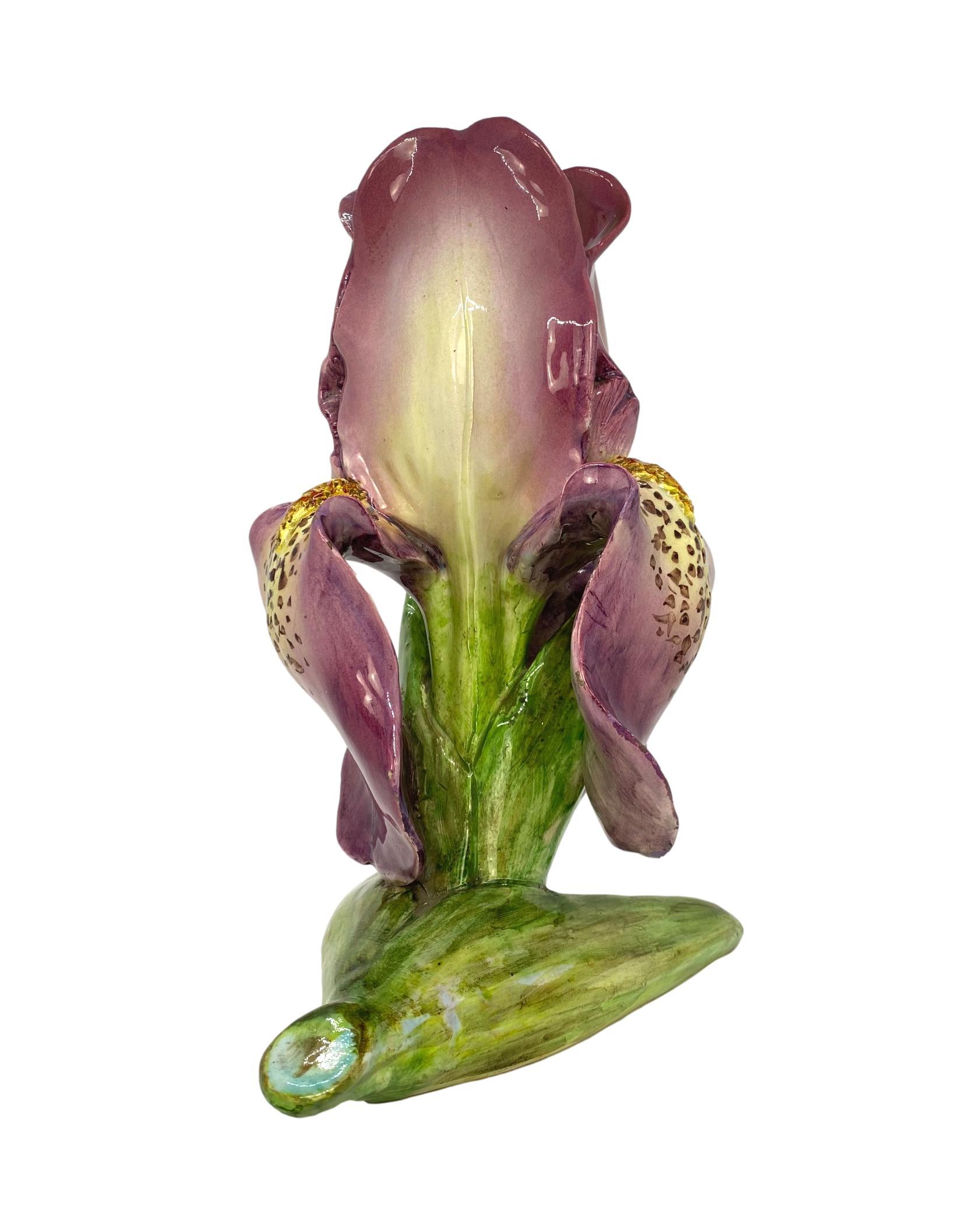 French Majolica (Barbotine) Iris-Form Vase by Delphin Massier, circa 1870, naturalistically modeled as an oversized blooming iris, the lavender petals forming the body, with an open-top, on a stalk-form base glazed in shades of green, singed on