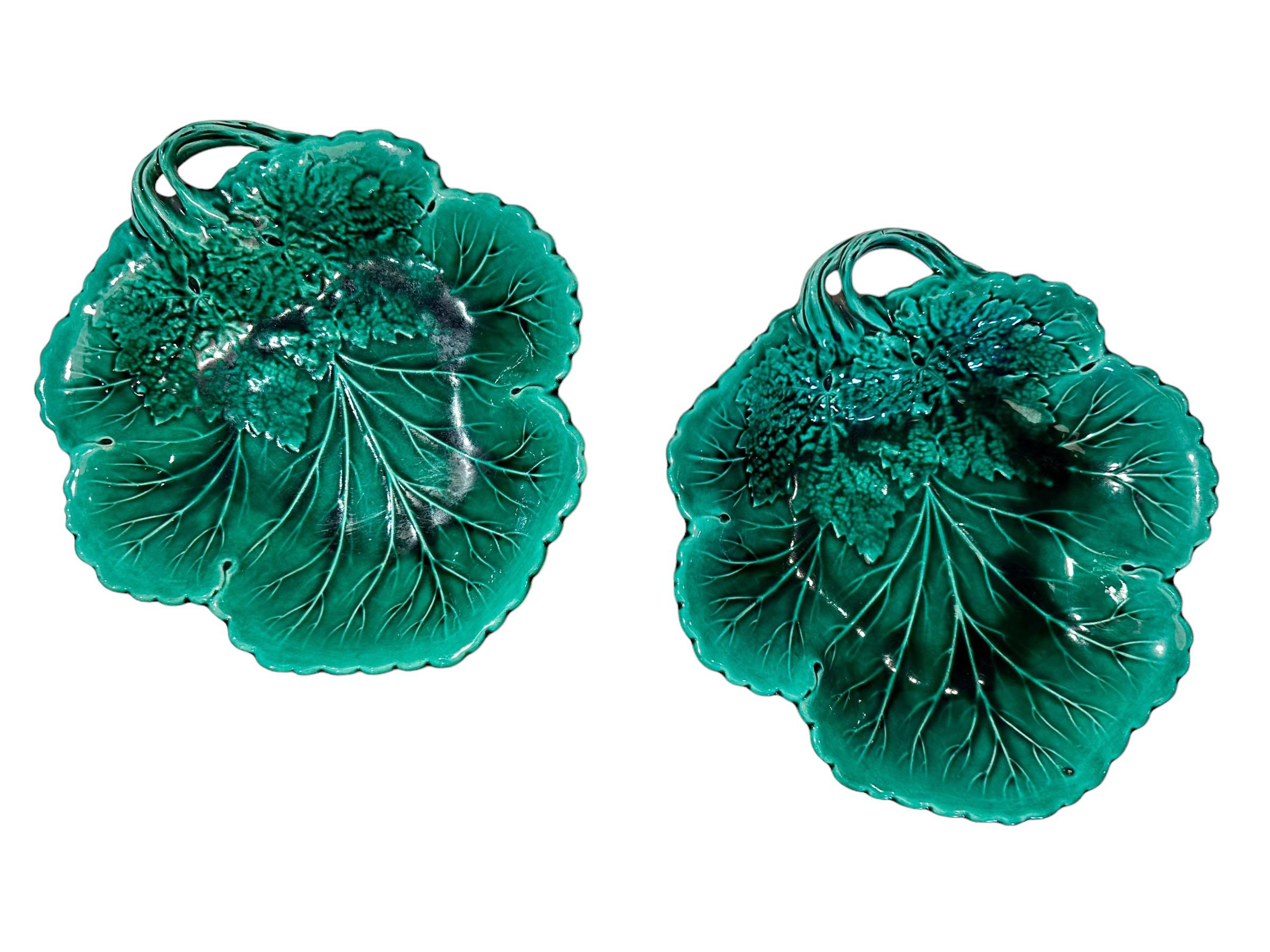  pair of striking majolica leaf bowls from the 19th century. Great color. There is a mark on the reverse. Most likely English.