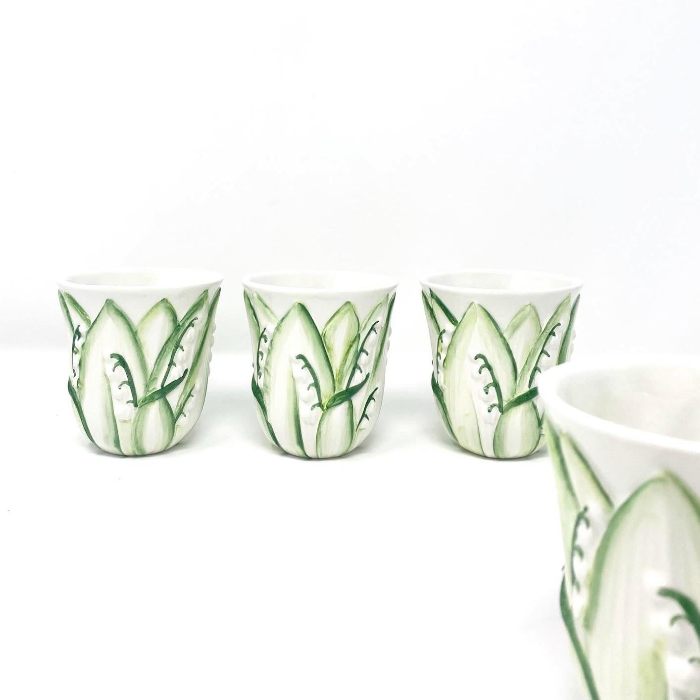 Majolica Lily of the Valley Tumbler, Set of 4, Handmade in Italy for The Mane Lion

The Mane Lion was born in 1979 in the heart of Philadelphia's fabled Main Line, offering a line of charming, hand-painted chip-and-dip serving pieces that enhanced