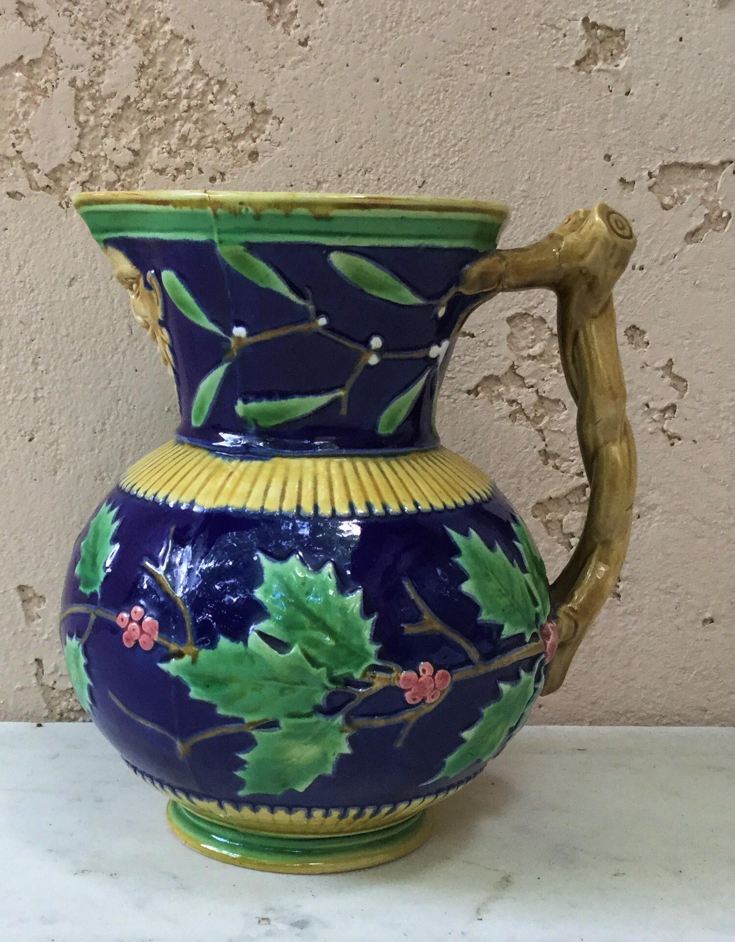 Majolica Minton Christmas pitcher circa 1890 with holly and mistletoe.