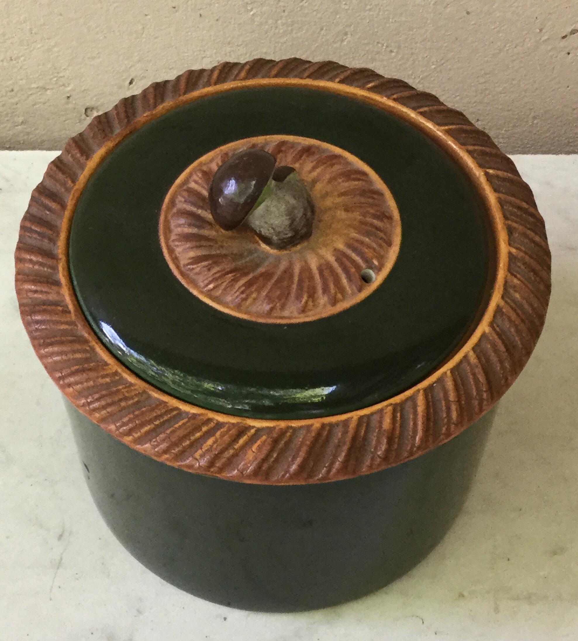 French Majolica green tureen with a mushroom on the handle signed Pillivuyt et Cie, circa 1920.