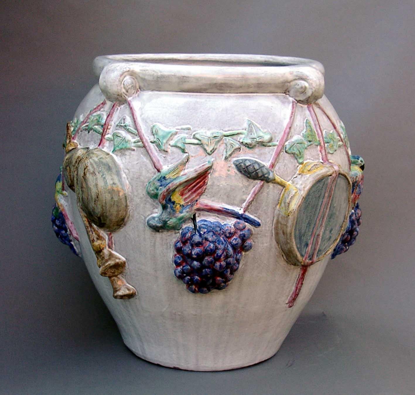 Mid-Century Modern Majolica Nymphenburg handcrafted and hand painted planter with relief of cherubs For Sale