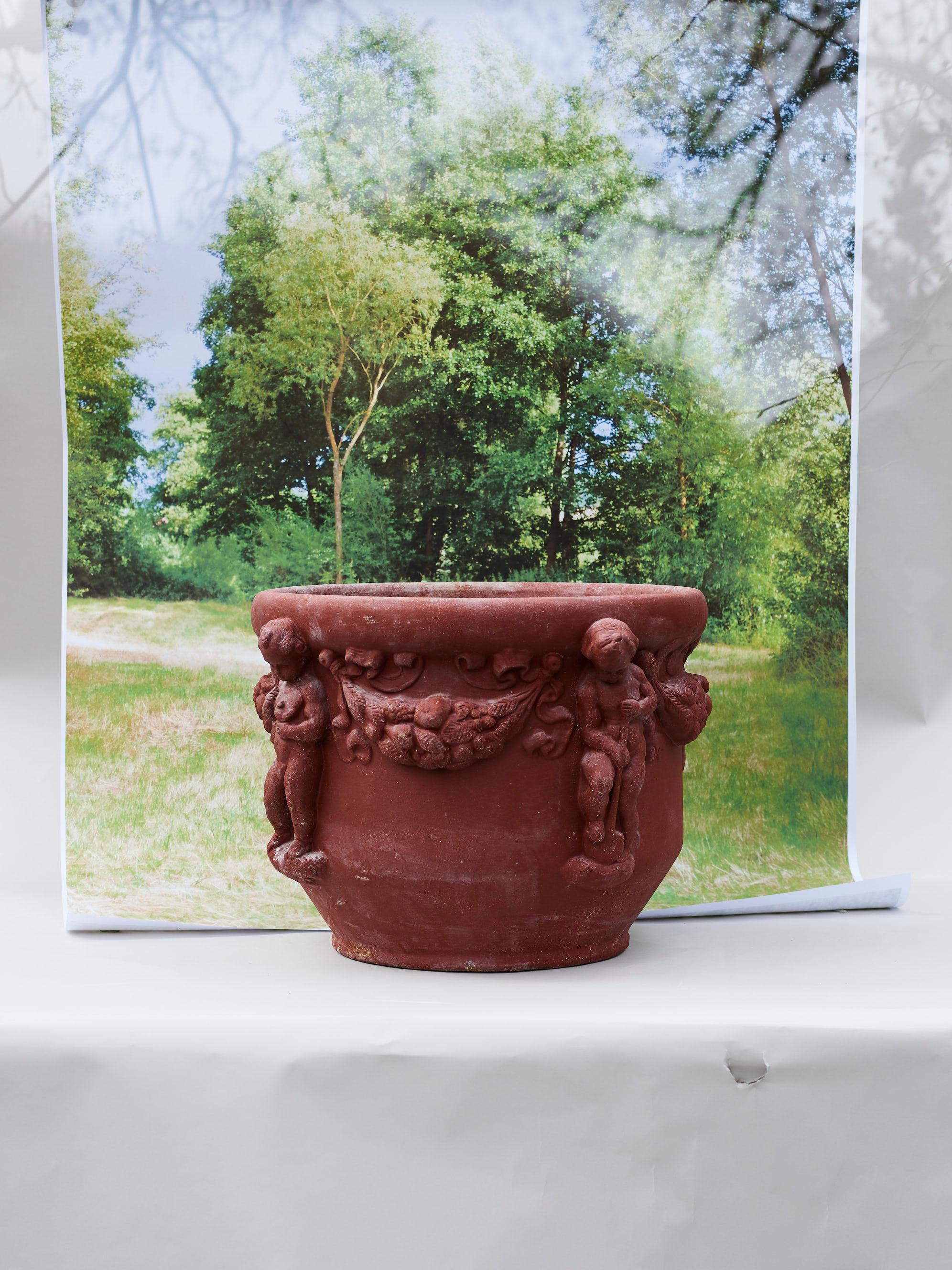 Hand-Crafted Majolica Nymphenburg handcrafted and hand painted planter with relief of cherubs For Sale