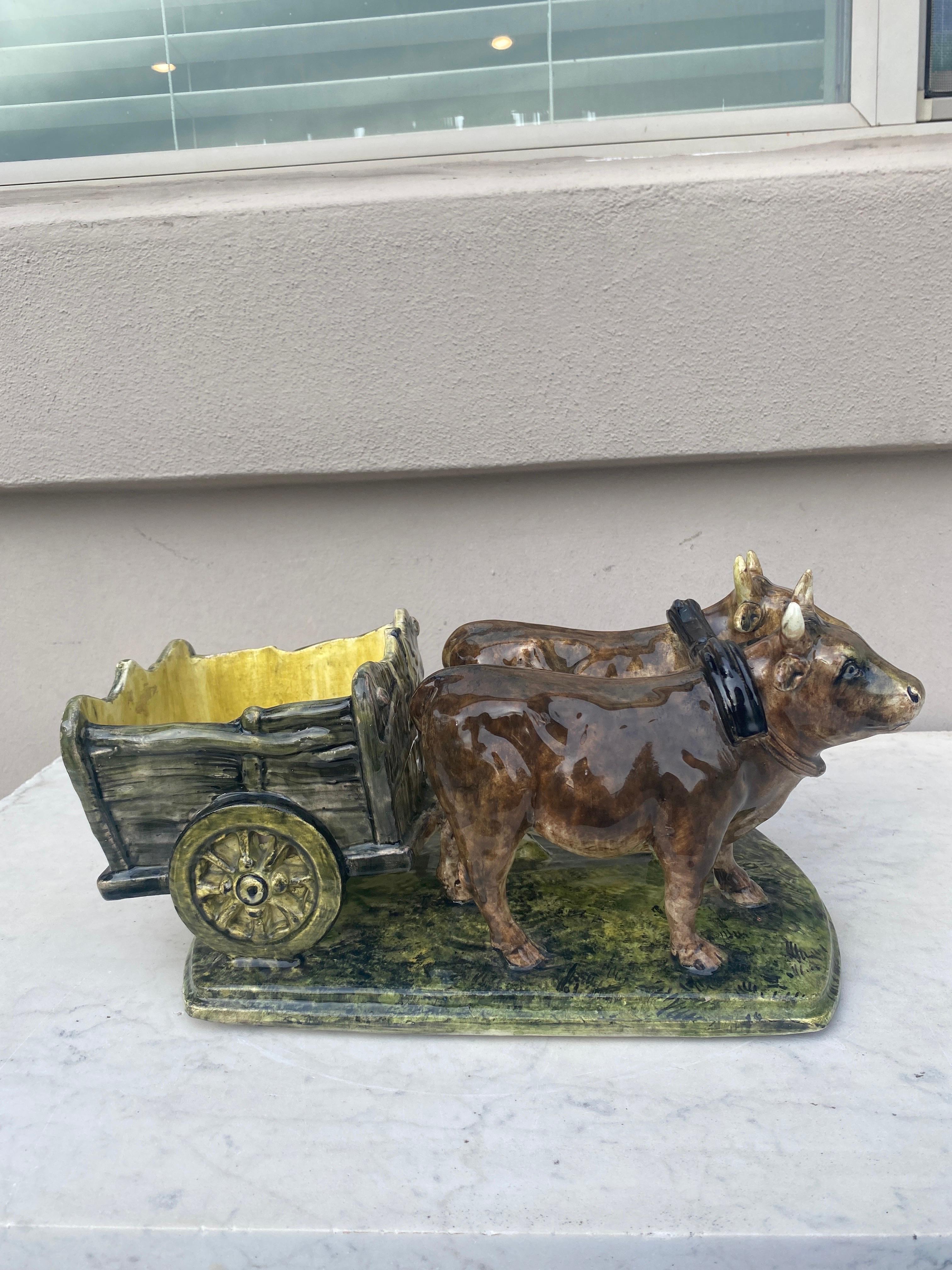 Antique Majolica oxen cart jardiniere circa 1900, signed Clement Massier Golfe-Juan.
Reference: Page 111 