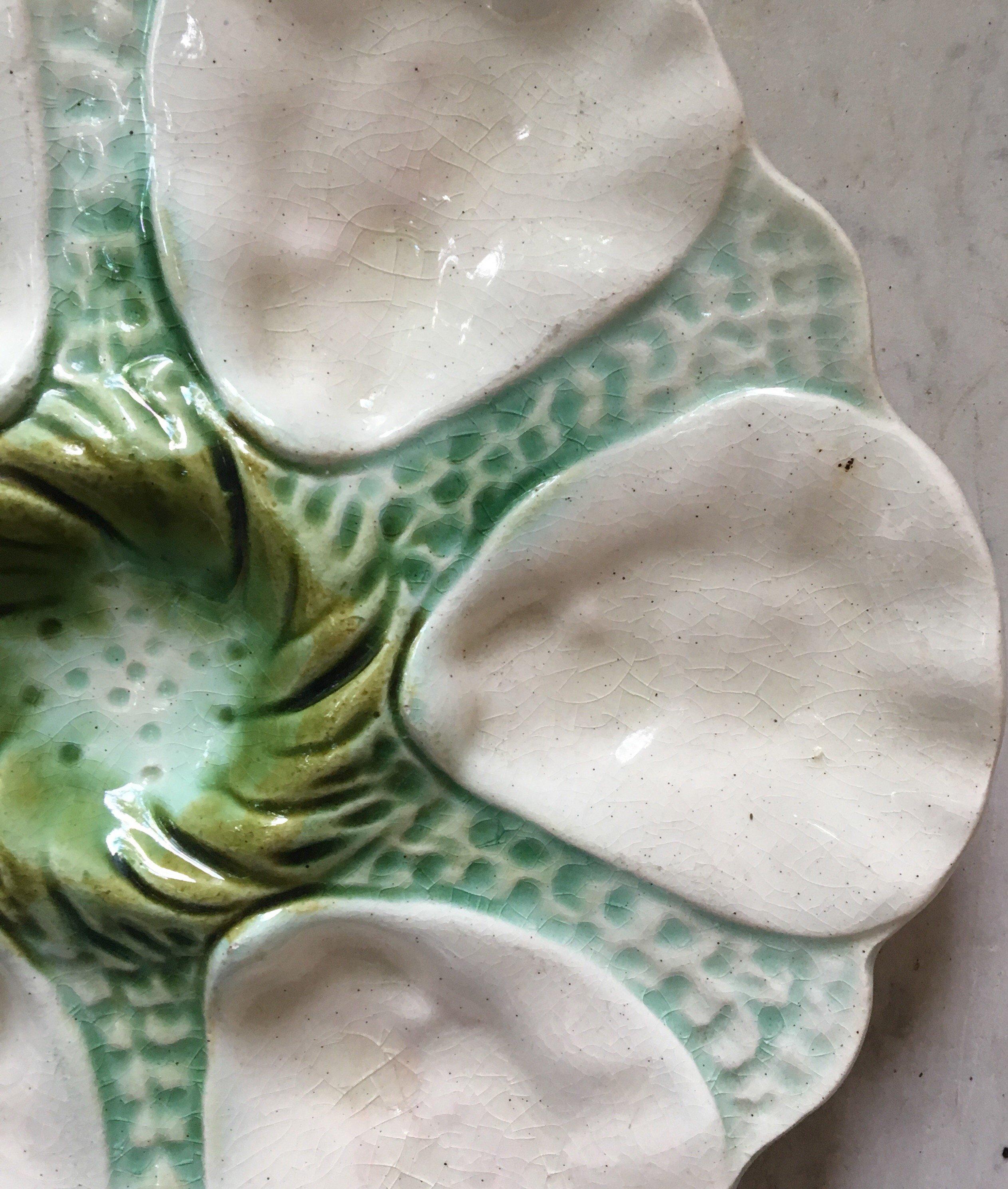Green Majolica oyster plate attributed to Orchies, circa 1900.
 