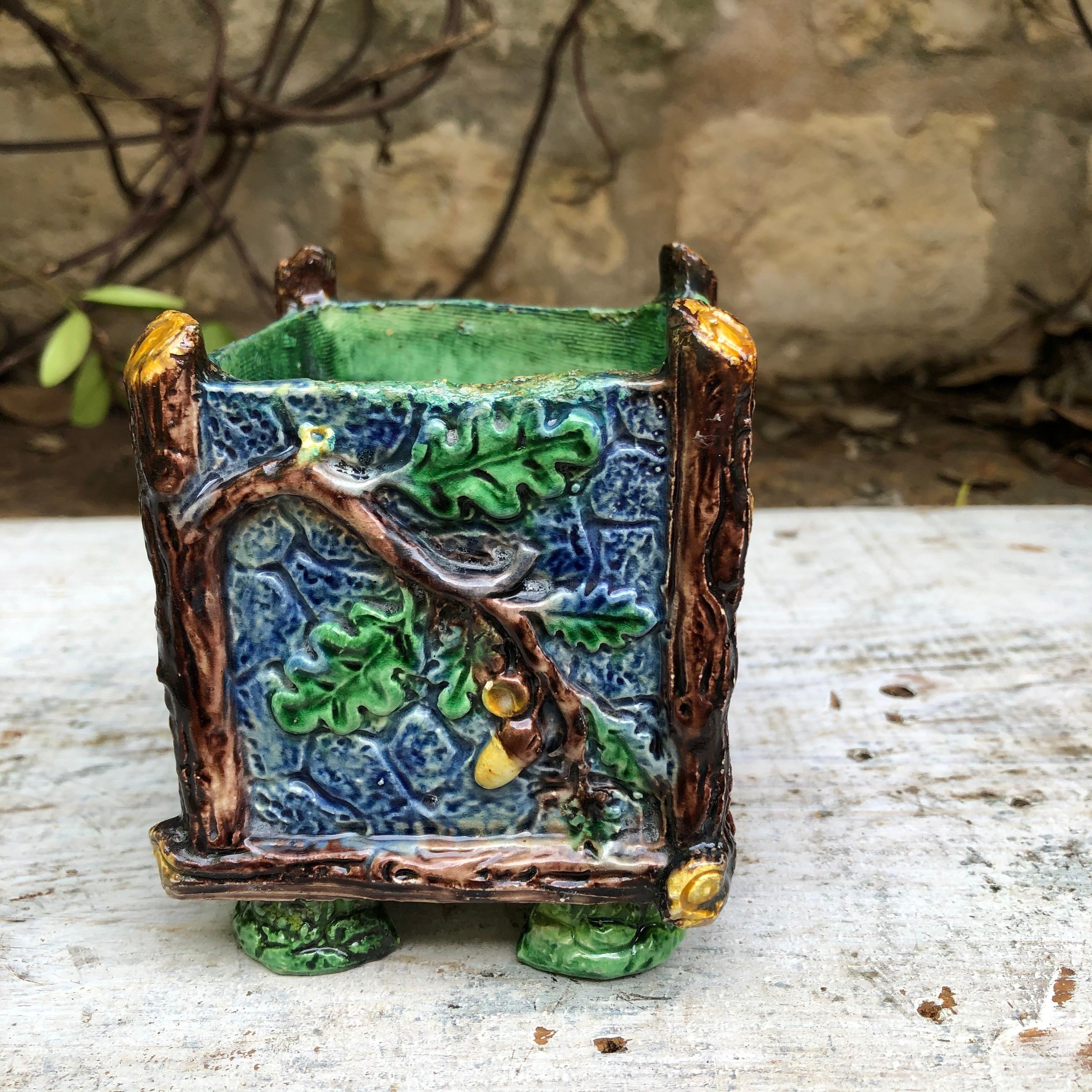 Majolica Palissy square jardinière, two sides with oak leaves and acorns, two sides with grapes signed Thomas Sergent.
Thomas Victor Sergent was an active member of the School of Paris with others ceramists he made platters and other several others