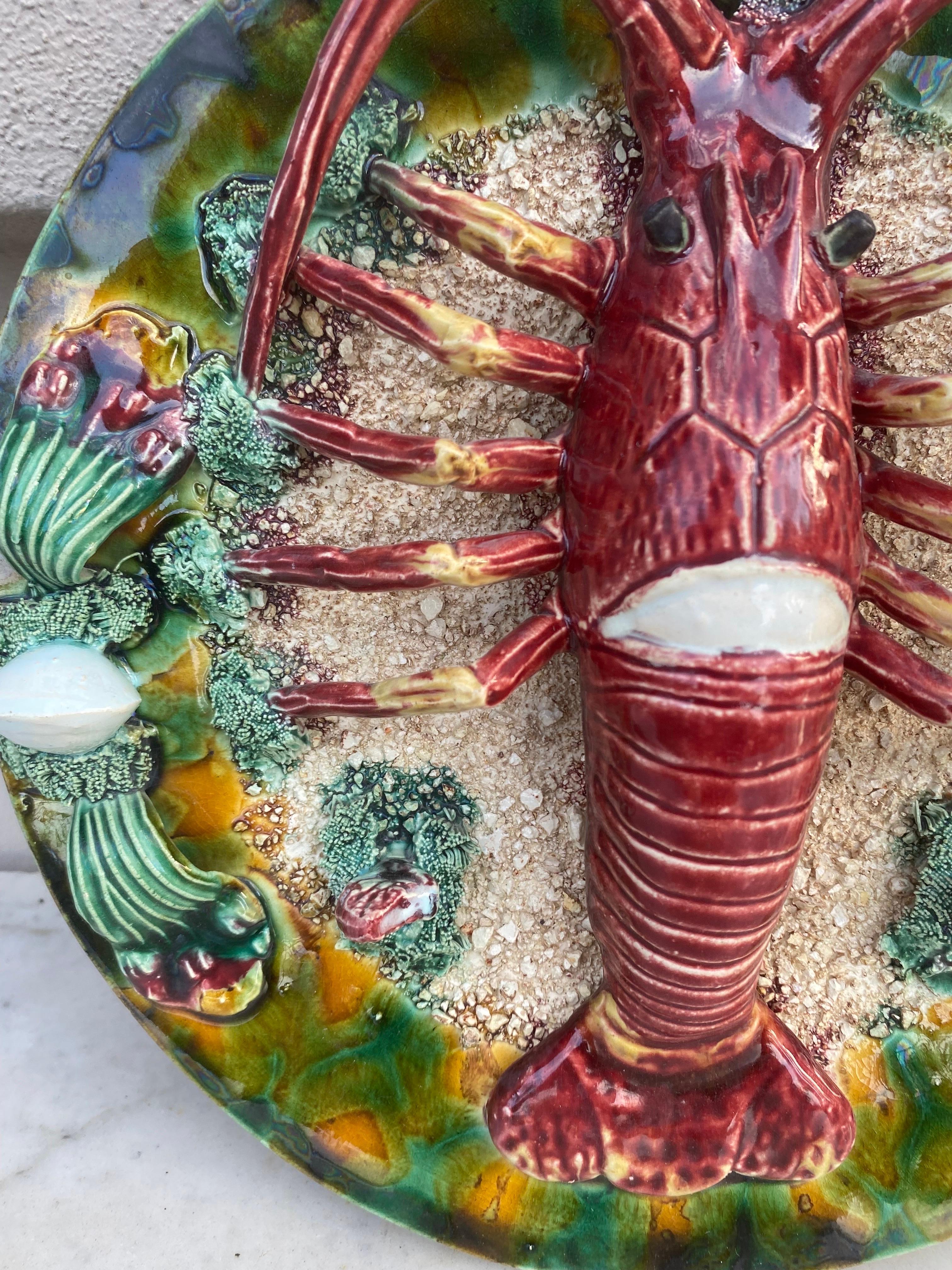 Large Majolica Palissy Portuguese lobster platter, circa 1940.
Decorated with mussels and shells,
Signed Caldas da Rainha.
12.5 inches Diameter.