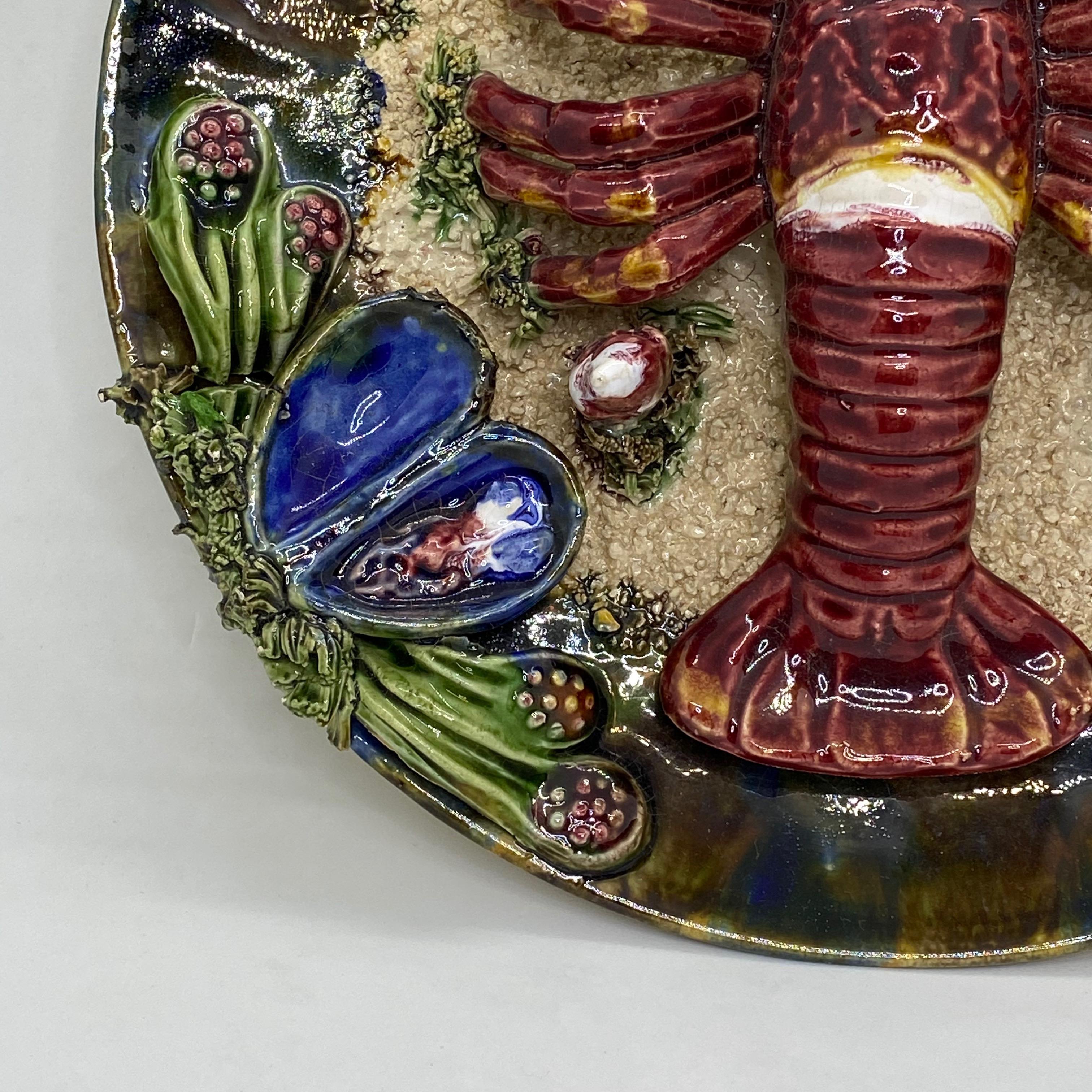 Beautiful majolica wall decoration. A Lobster motif. A beautiful piece of art for any room. The right one of the Lobster feeler was repaired.